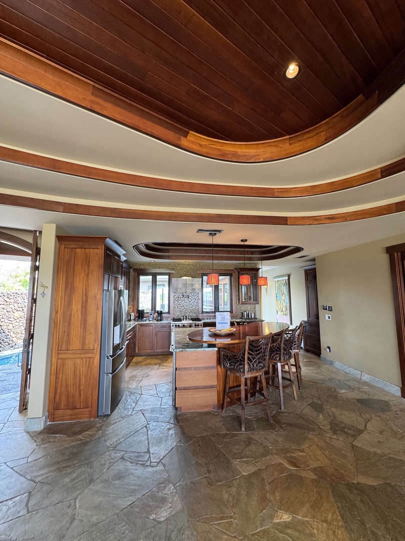 Kamuela Vacation Rentals, Hale Konane - Entertain effortlessly in the spacious kitchen with premium appliances and island seating.