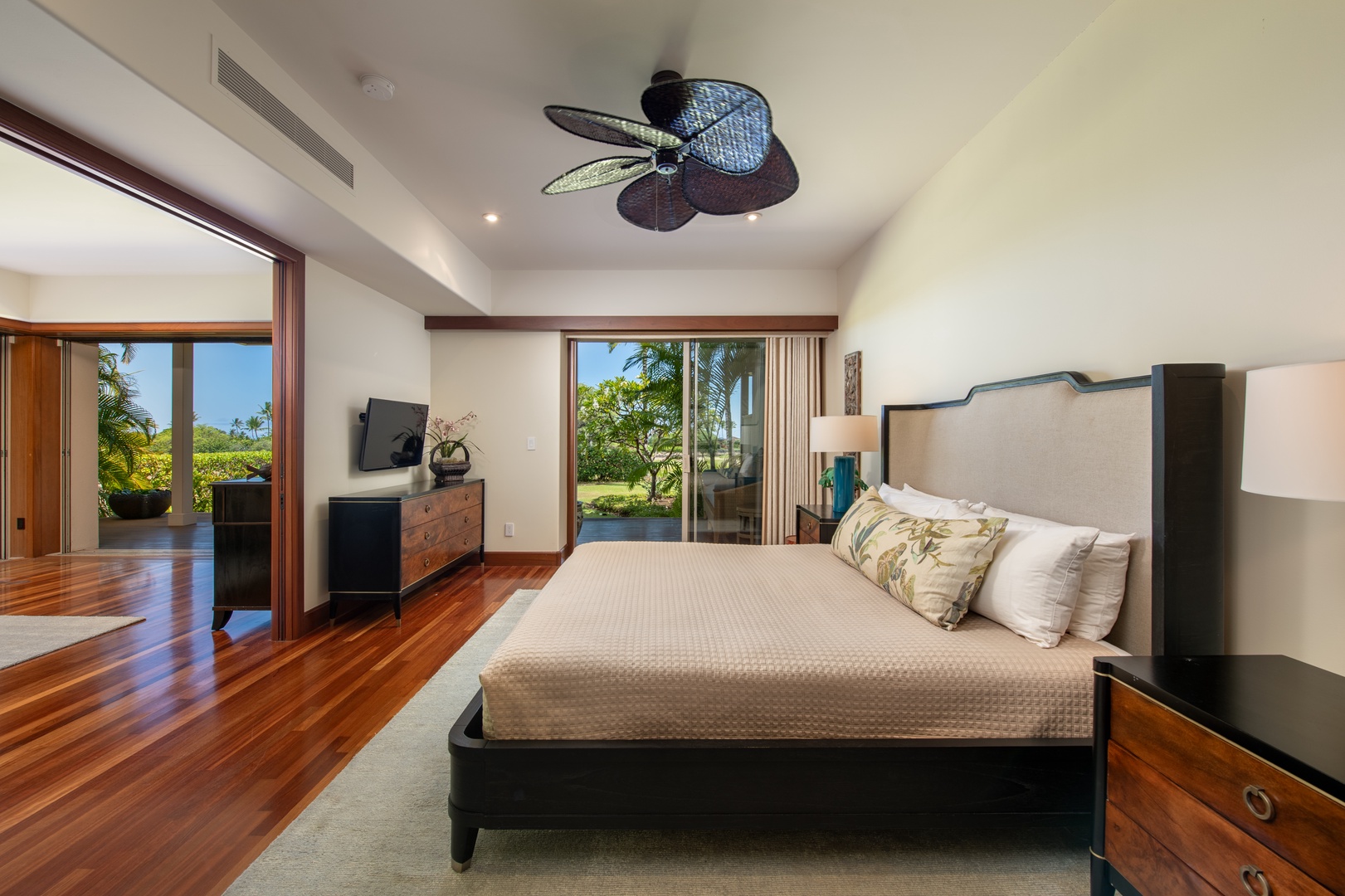 Kailua Kona Vacation Rentals, 3BD Ka'Ulu Villa (109A) at Four Seasons Resort at Hualalai - The primary suite has TV, central AC, private lanai and ensuite bath.