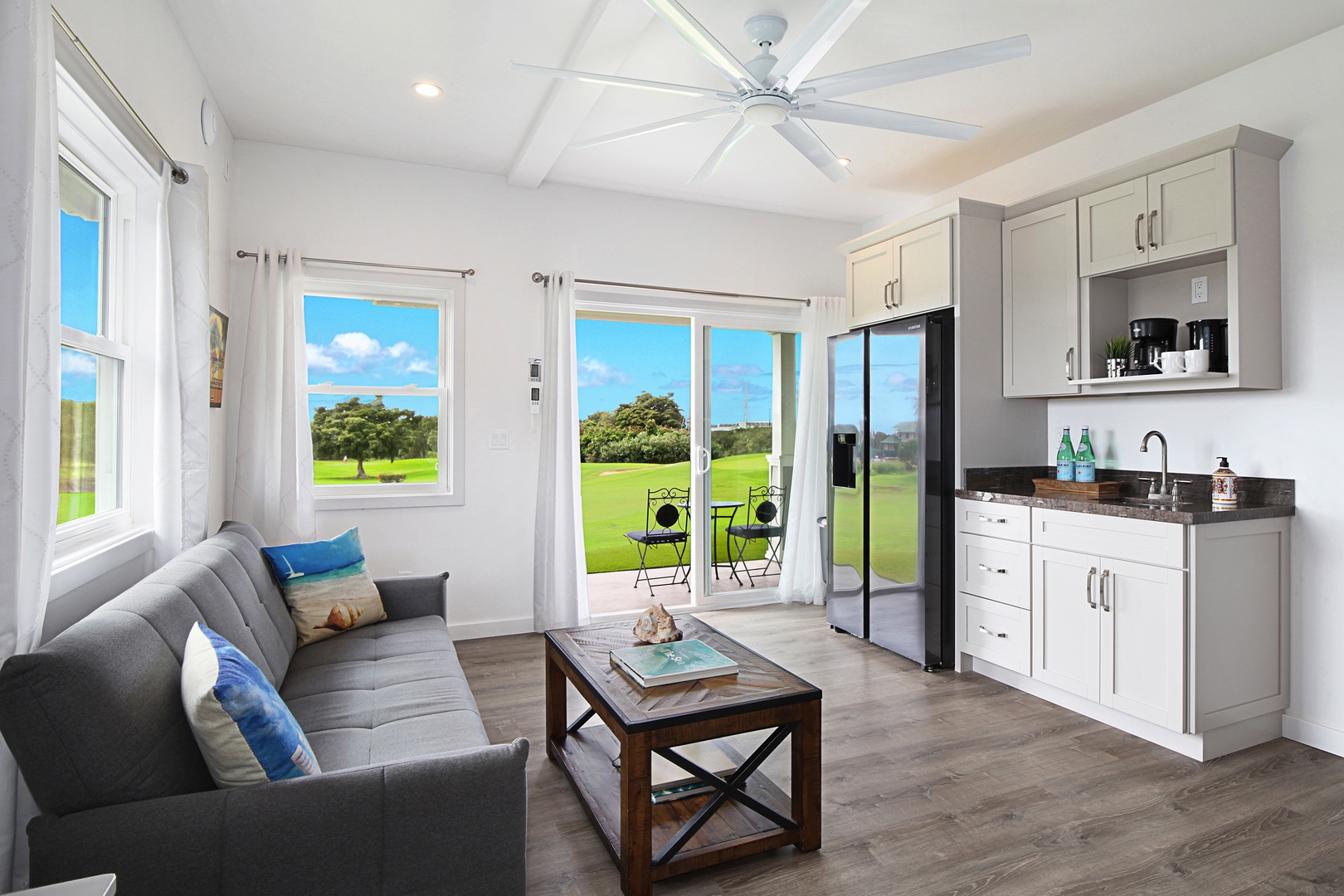 Koloa Vacation Rentals, Haupu Hale at Poipu - Guest bedroom 1 with kitchenette, offering the convenience of a private dining and lounging space.