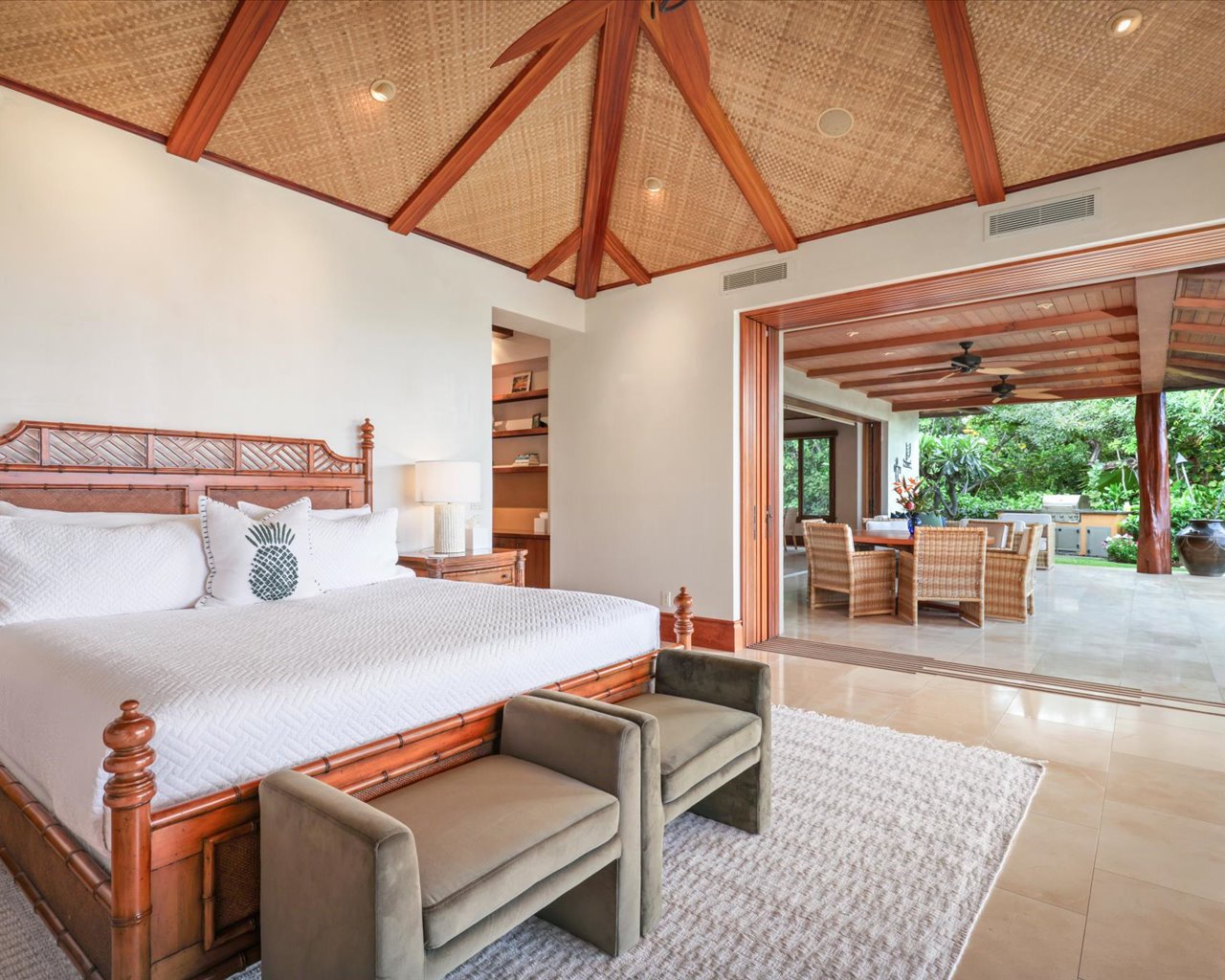 Kailua Kona Vacation Rentals, 3BD Pakui Street Estate (131) at Hualalai Resort - Primary bedroom suite with a king bed, lanai access, smart TV, personal desk & an en suite bath