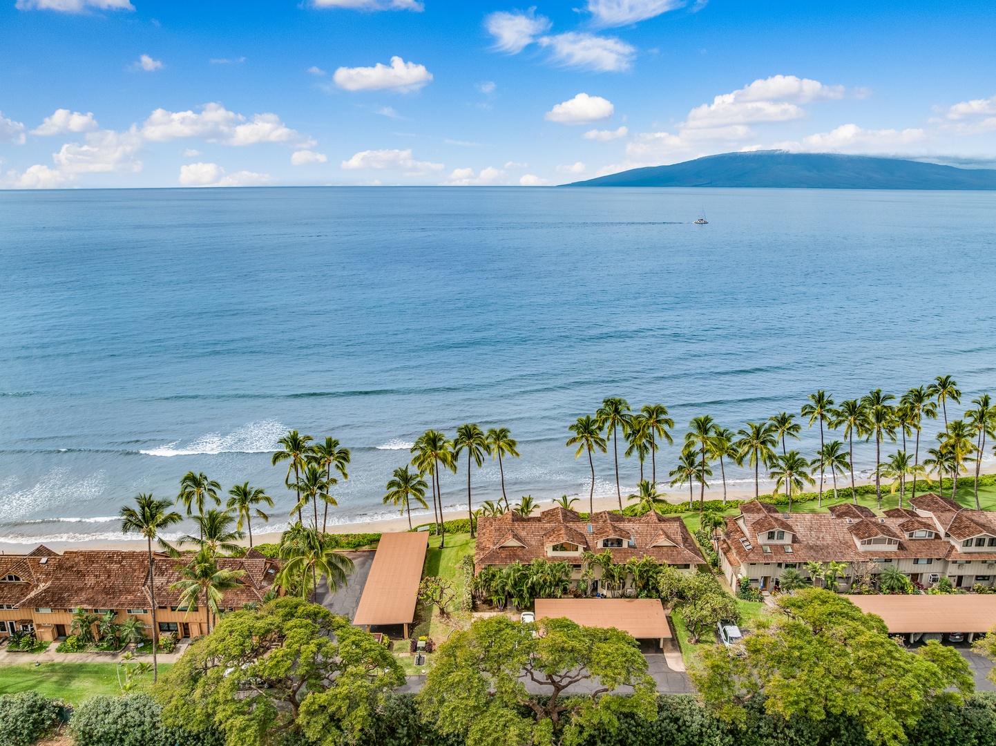 Lahaina Vacation Rentals, Puamana 254-2 - An aerial view of Puamana 254-2 highlights its prime location, just steps from the ocean.