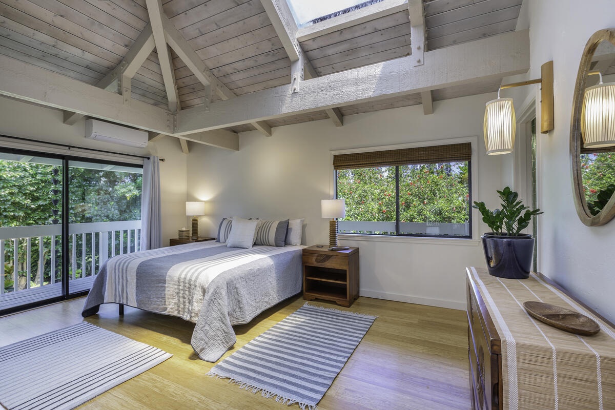 Princeville Vacation Rentals, Hale Kalani - Retreat to the primary bedroom and discover a luxurious King bed, ample storage, and exquisite lighting, creating a private sanctuary just for you.