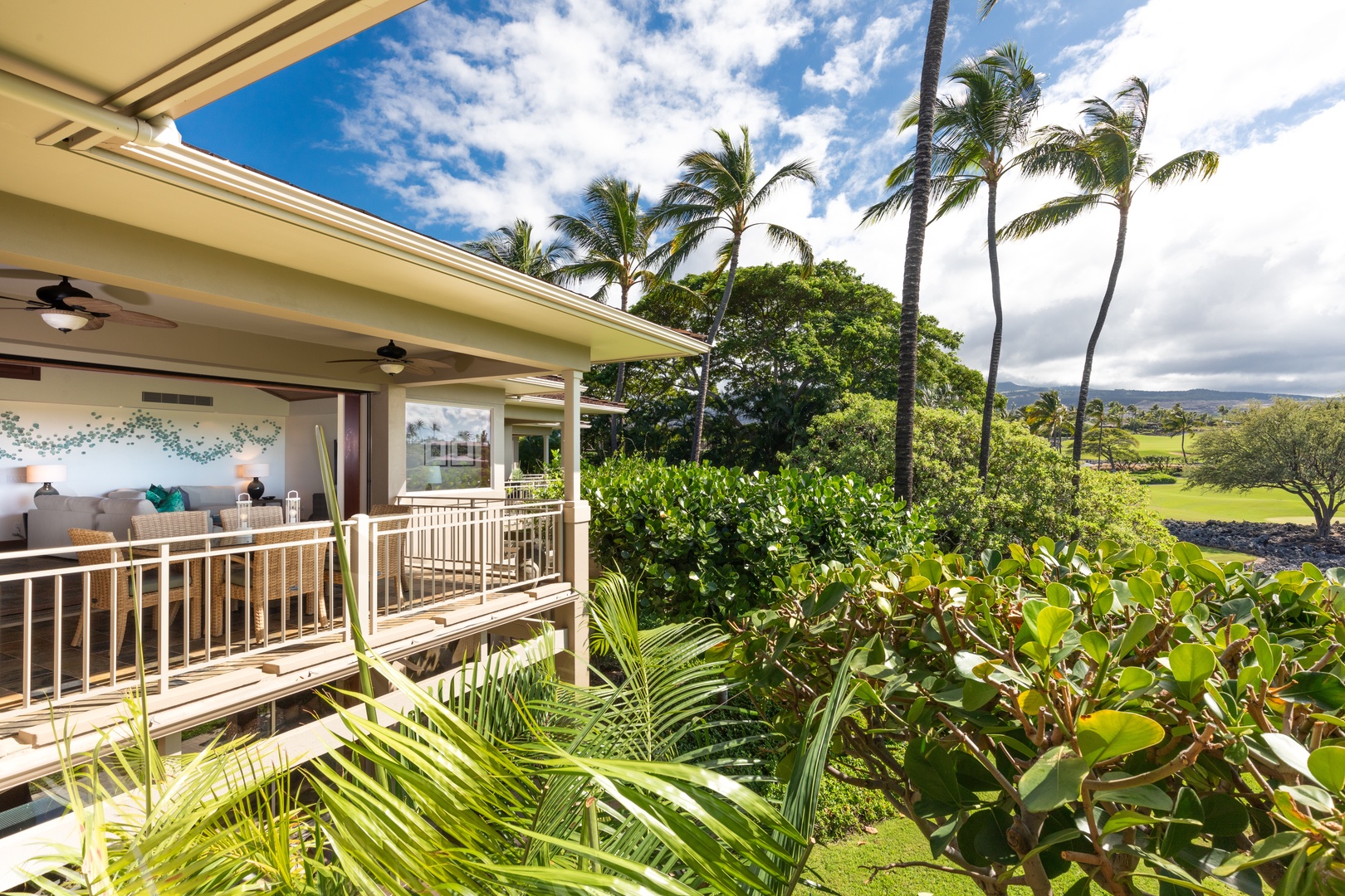 Kailua Kona Vacation Rentals, 3BD Waiulu Villa (111D) at Hualalai Resort - Scenic balcony overlooking vibrant greenery and palm trees, offering a tranquil retreat.