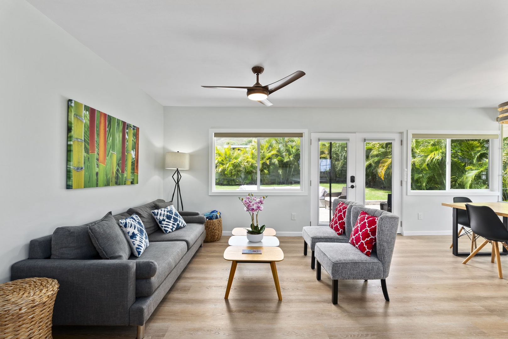 Kailua Vacation Rentals, Hale Alapi'i Lanikai Getaway - This inviting living area is designed for comfort and style, featuring a cozy sofa and vibrant accents that create a welcoming space