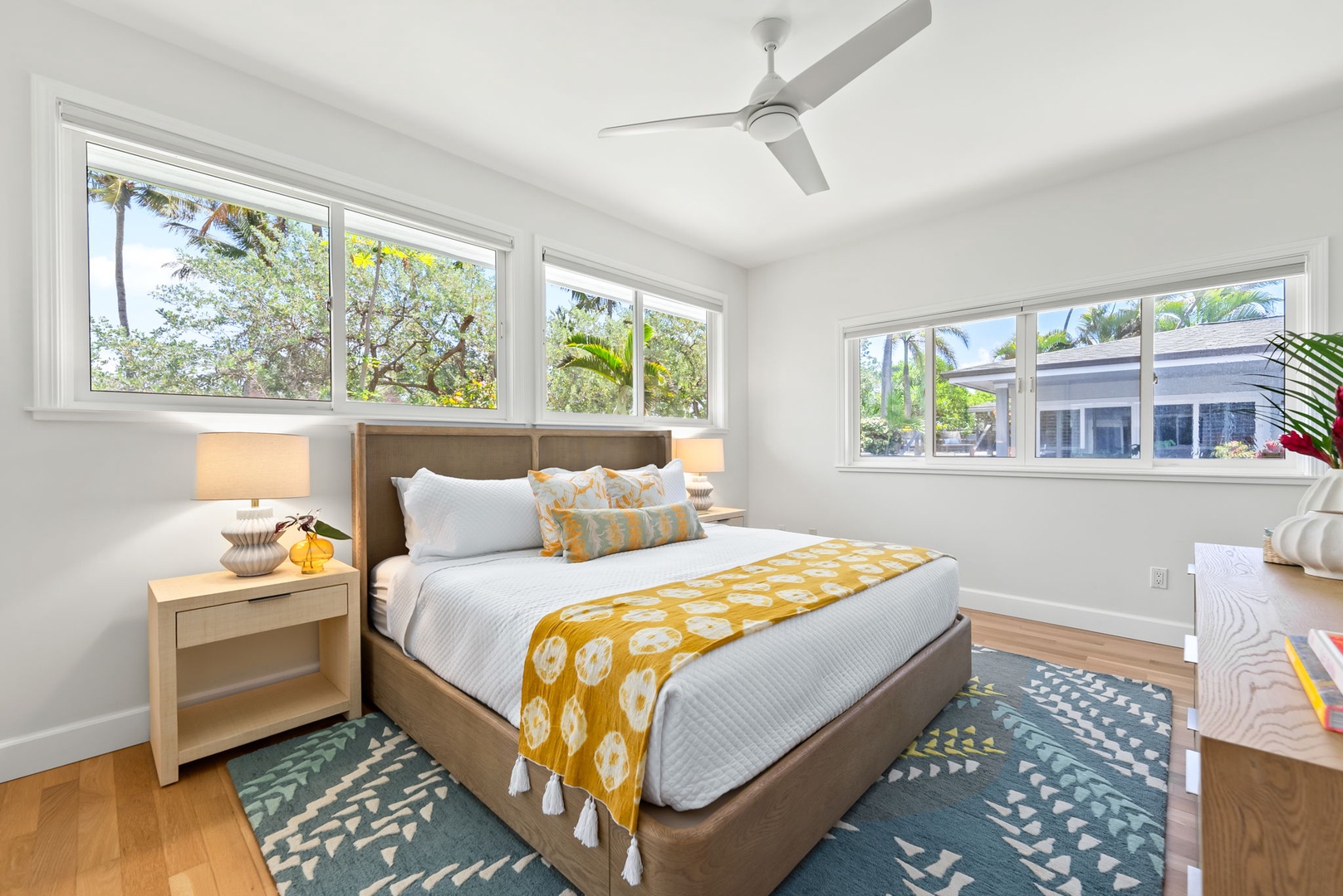 Kailua Vacation Rentals, Kailua Beach House - Bright and airy bedroom with garden views and colorful island vibes.