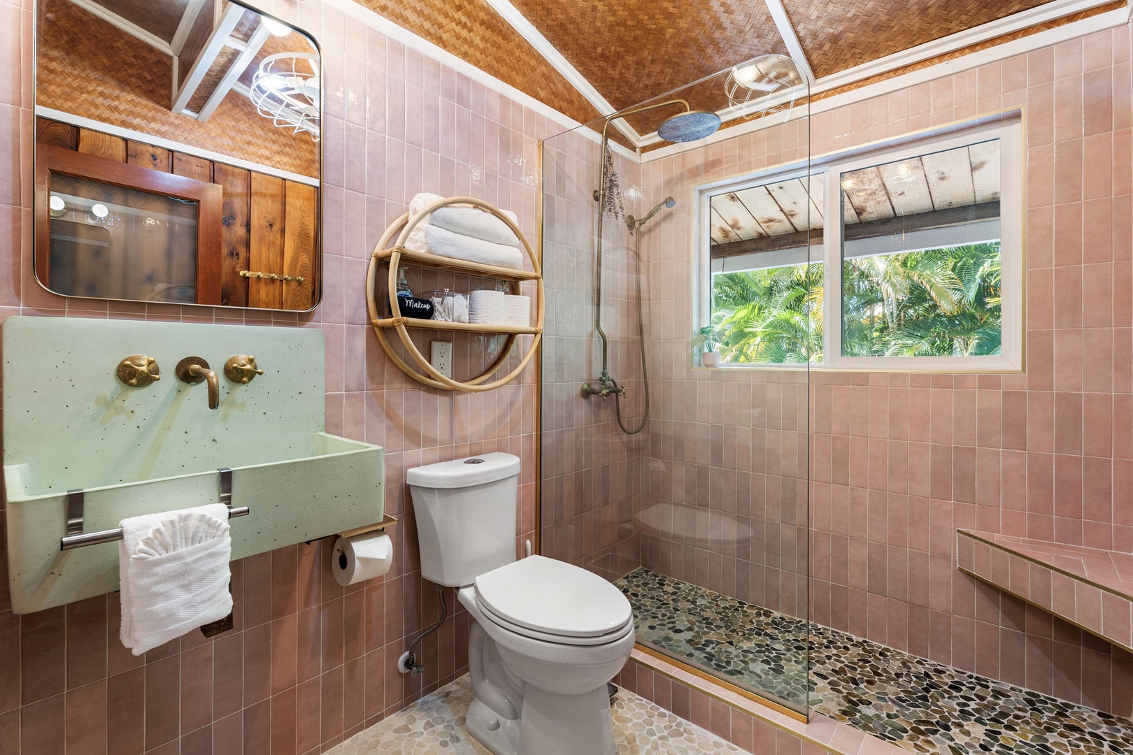 Kailua Kona Vacation Rentals, Mai Tai Manor - Refresh in your private bathroom with stylish subway tiles, a rainfall shower, and tropical garden views through the window.