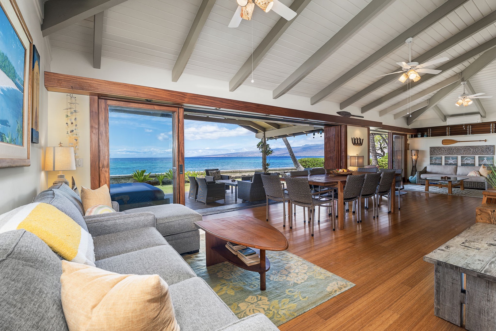 Kamuela Vacation Rentals, Island Time Retreat - Wood floors, a vaulted ceiling, and an ocean view that runs the length of the great room.
