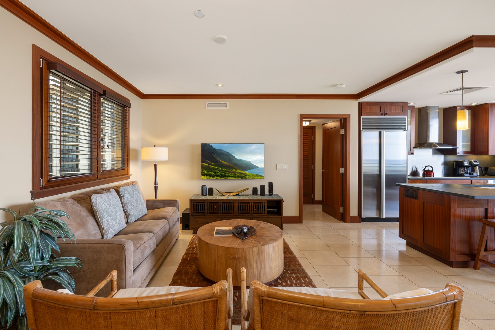 Kapolei Vacation Rentals, Ko Olina Beach Villas B901 - Sink into plush seating and enjoy your spacious open-concept retreat with modern kitchen and warm tropical touches.