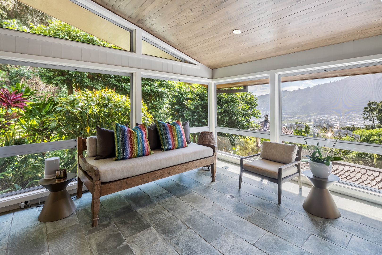 Honolulu Vacation Rentals, Manoa Royal Retreat - Covered lanai seating with panoramic views—perfect for your morning coffee or sunset wine.
