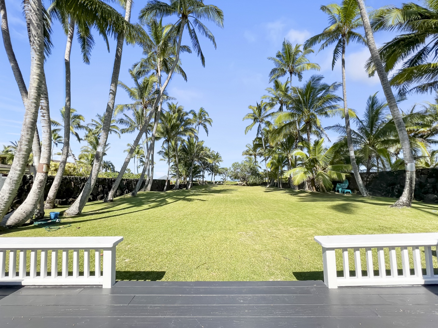 Kailua Vacation Rentals, Kai Mele - Enjoy views of the tropical landscape and ocean from the front porch