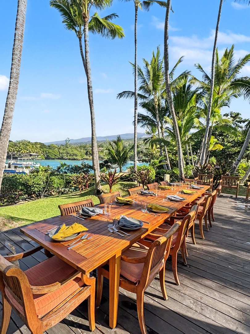 Kailua-Kona Vacation Rentals, Hahalua Bay Villa - Dine beneath swaying palms with stunning water views as your backdrop at this beautiful outdoor dining space.