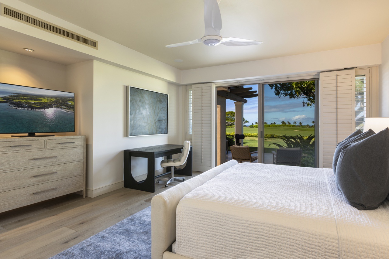 Kailua Kona Vacation Rentals, 3BD Palm Villa (130B) at Four Seasons Resort at Hualalai - Primary bedroom suite (lower level) with king bed, lanai access, 55” smart television, walk-in closet & en suite bath