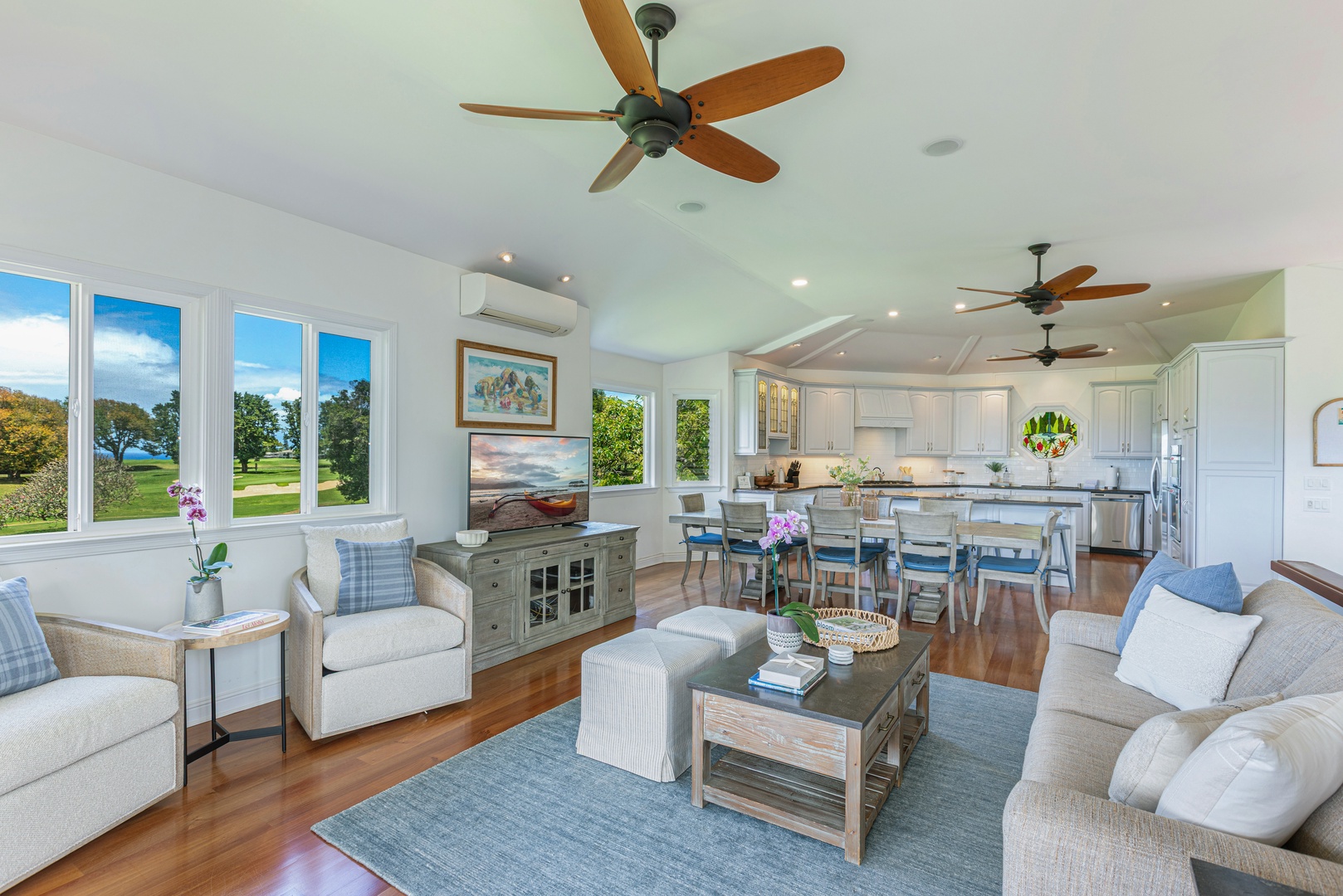 Princeville Vacation Rentals, Ohana Kamalani - Open-concept living and dining area with serene golf course views and plenty of space for entertaining or family time.