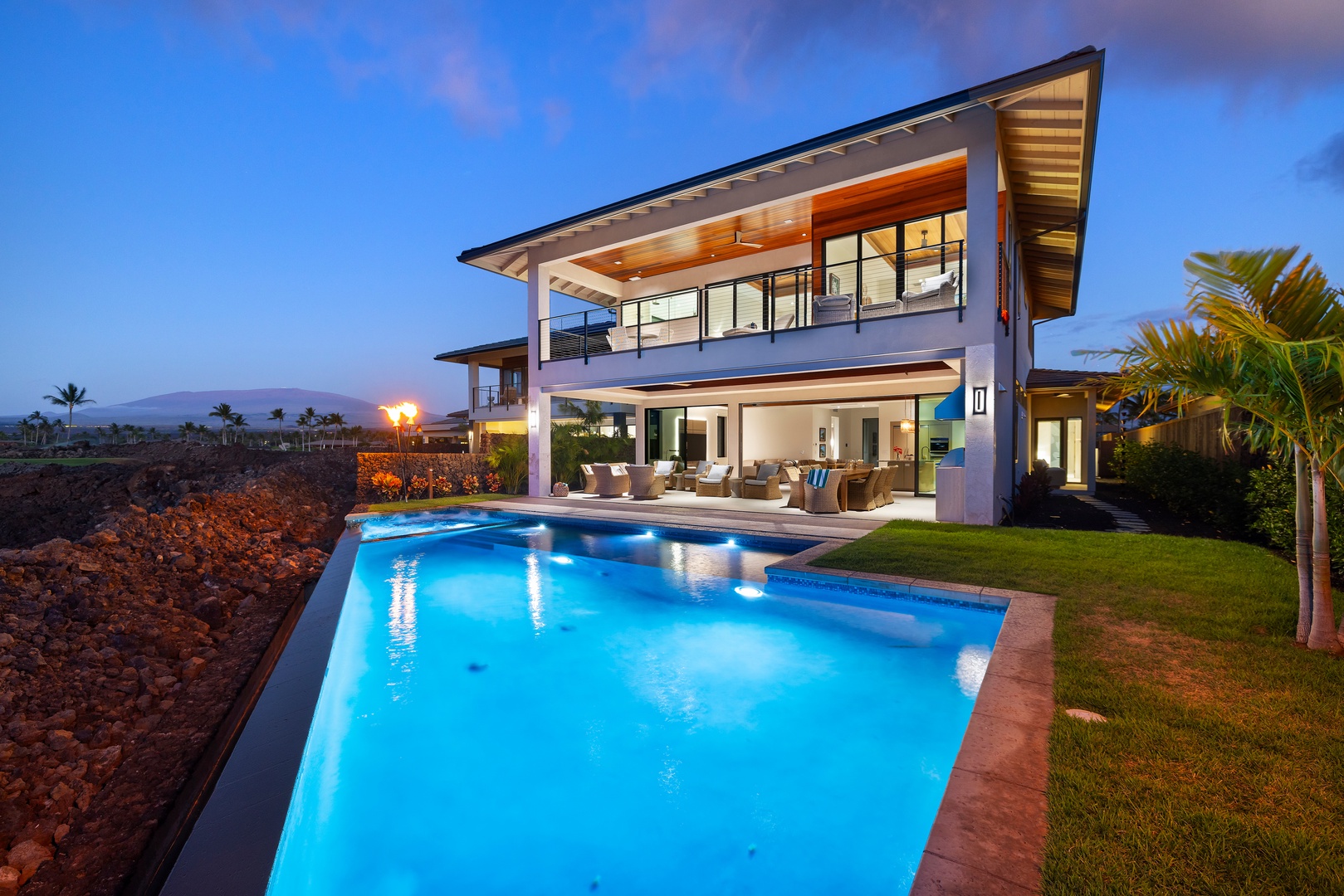 Kamuela Vacation Rentals, 6BD Mauna Lani Lux Golf Estate (5) at One Ocean - The whole house reads against the deep blue of nightfall.