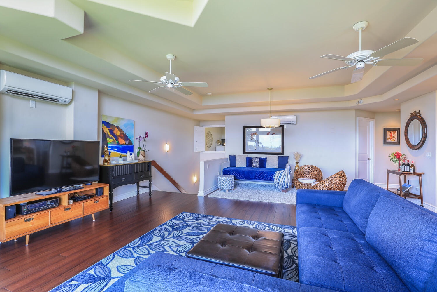 Princeville Vacation Rentals, Noelani Kai - Open floorplan concept with a sectional sofas.