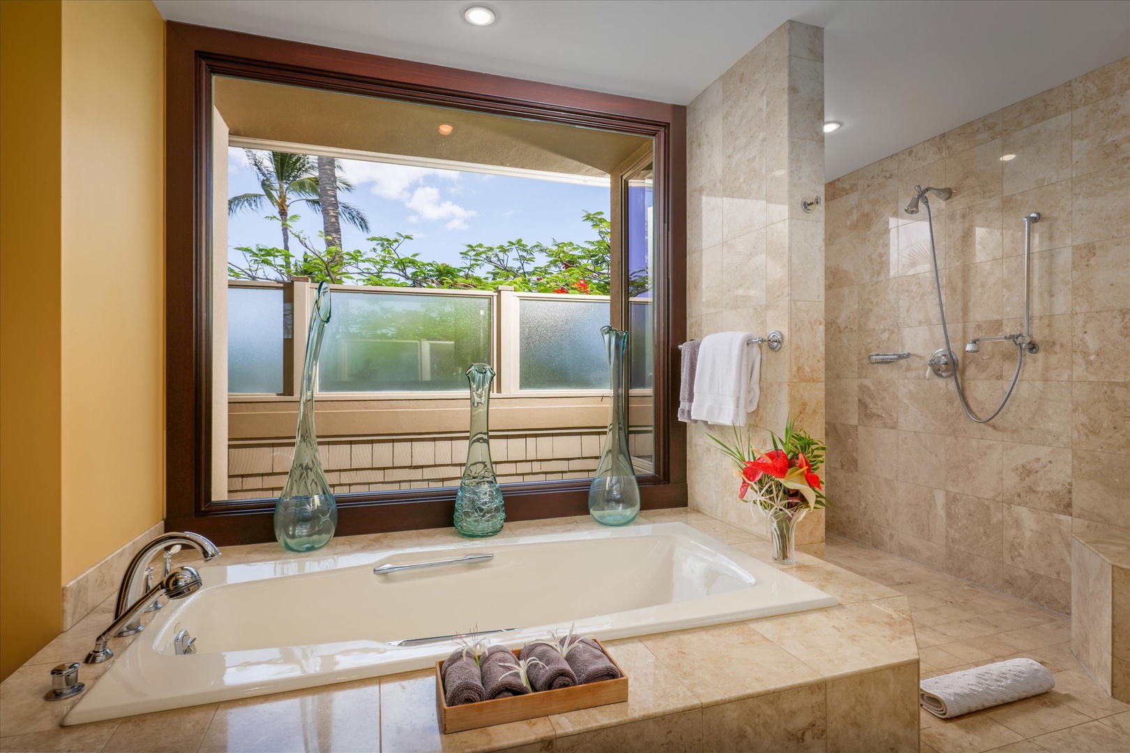 Kailua Kona Vacation Rentals, Wai'ulu Villa 115D - Bathe with a view—oversized tub framed by lush greenery and natural light.