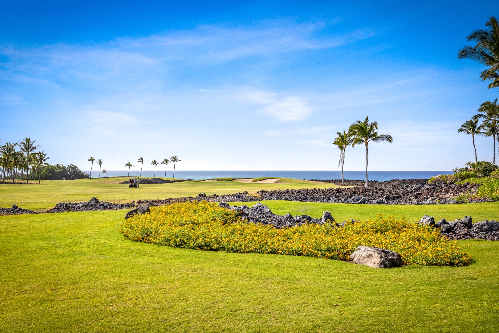 Waikoloa Vacation Rentals, 2BD Hali'i Kai (12C) at Waikoloa Resort - Your private lanai steps out to a grassy lawn, perfect for small children and anyone who appreciates extra outdoor space.