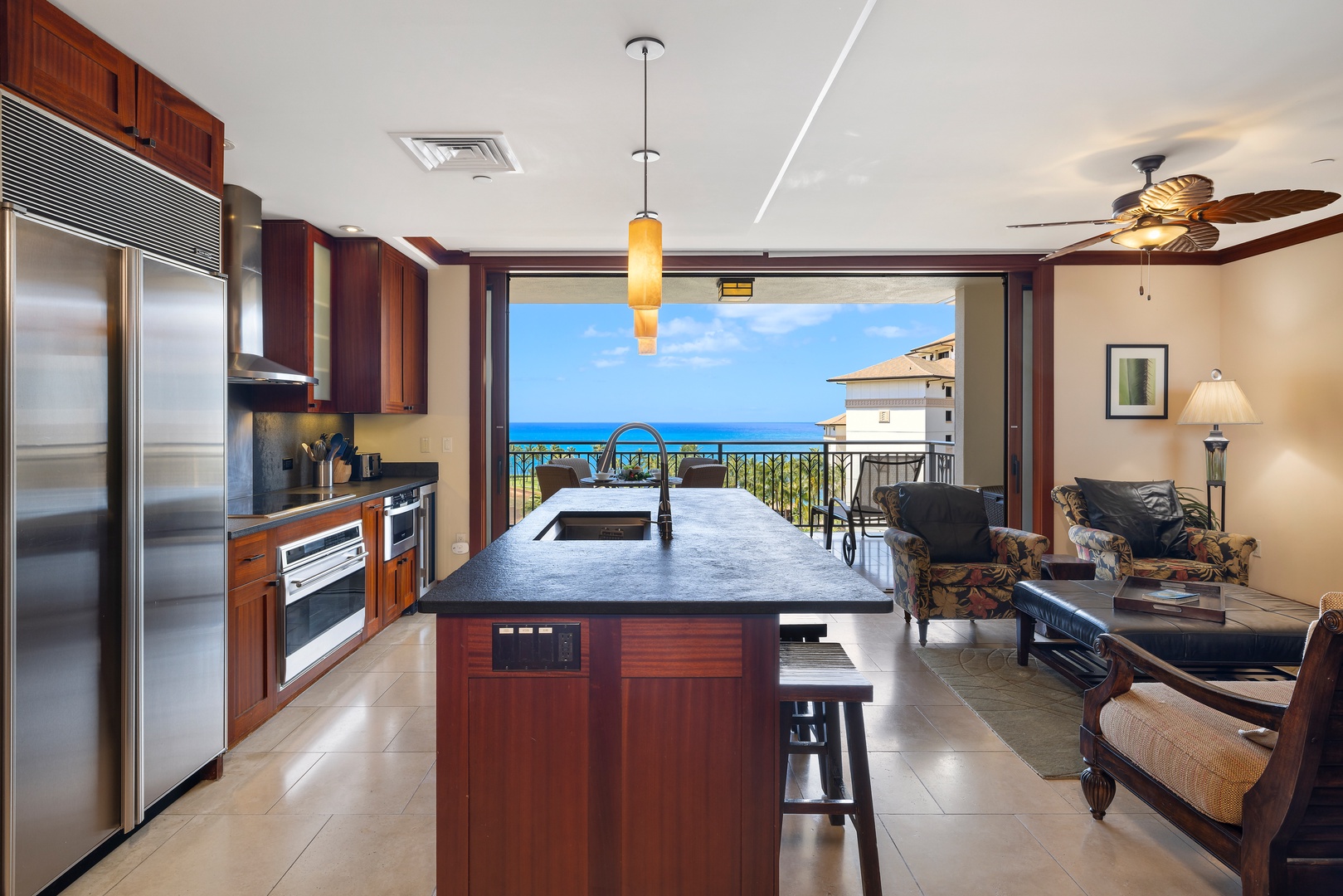 Kapolei Vacation Rentals, Ko Olina Beach Villas O805 - Open floor plan ensures a seamless flow from kitchen, dining, living and lanai areas.