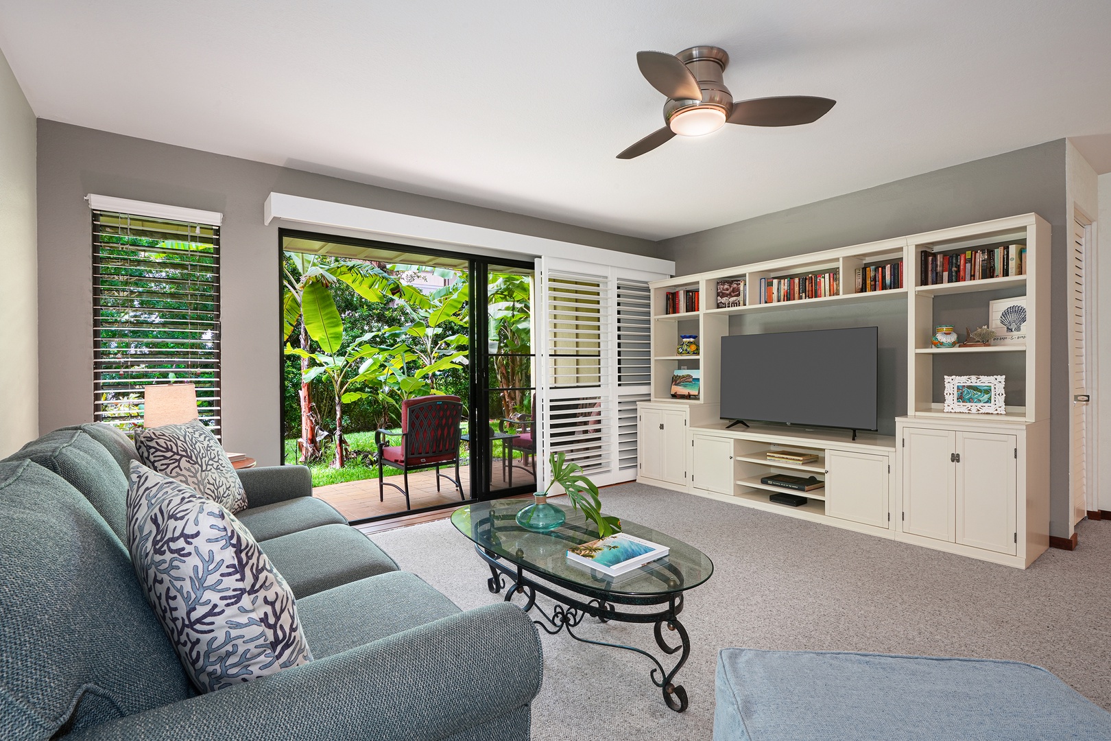 Koloa Vacation Rentals, Waikomo Streams 203 - Seamless indoor-outdoor living: a spacious living area seamlessly connects to the lanai, inviting the outdoors in.