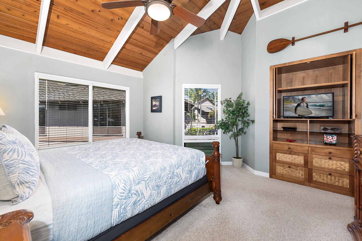 Kailua Kona Vacation Rentals, Kanaloa at Kona 3304 - Primary bedroom with vaulted ceilings, ocean views, and king-size comfort.