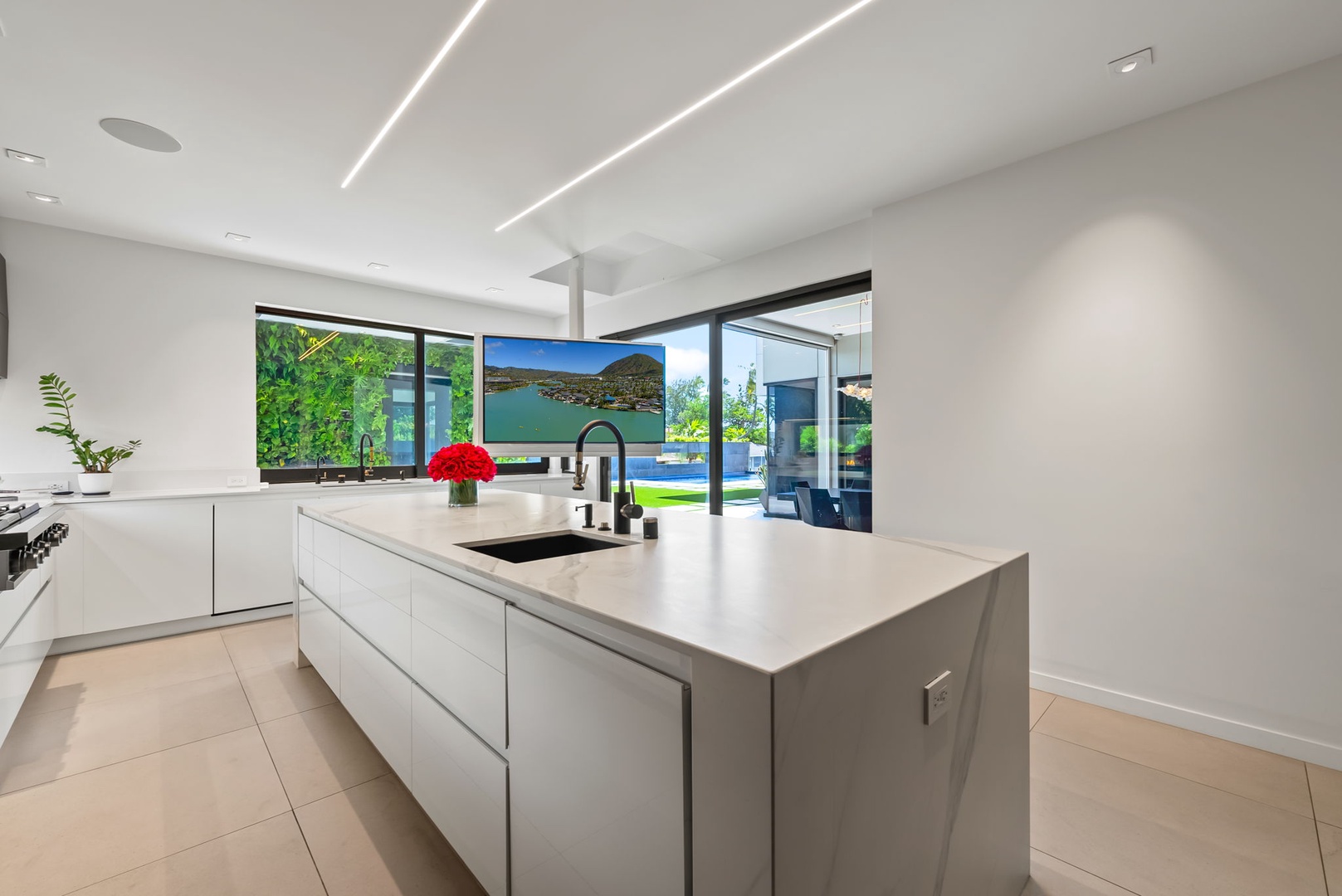 Honolulu Vacation Rentals, Ocean Villa Emilie - Clean lines, floor-to-ceiling light, and a minimalist aesthetic make every kitchen moment feel intentional and luxurious.