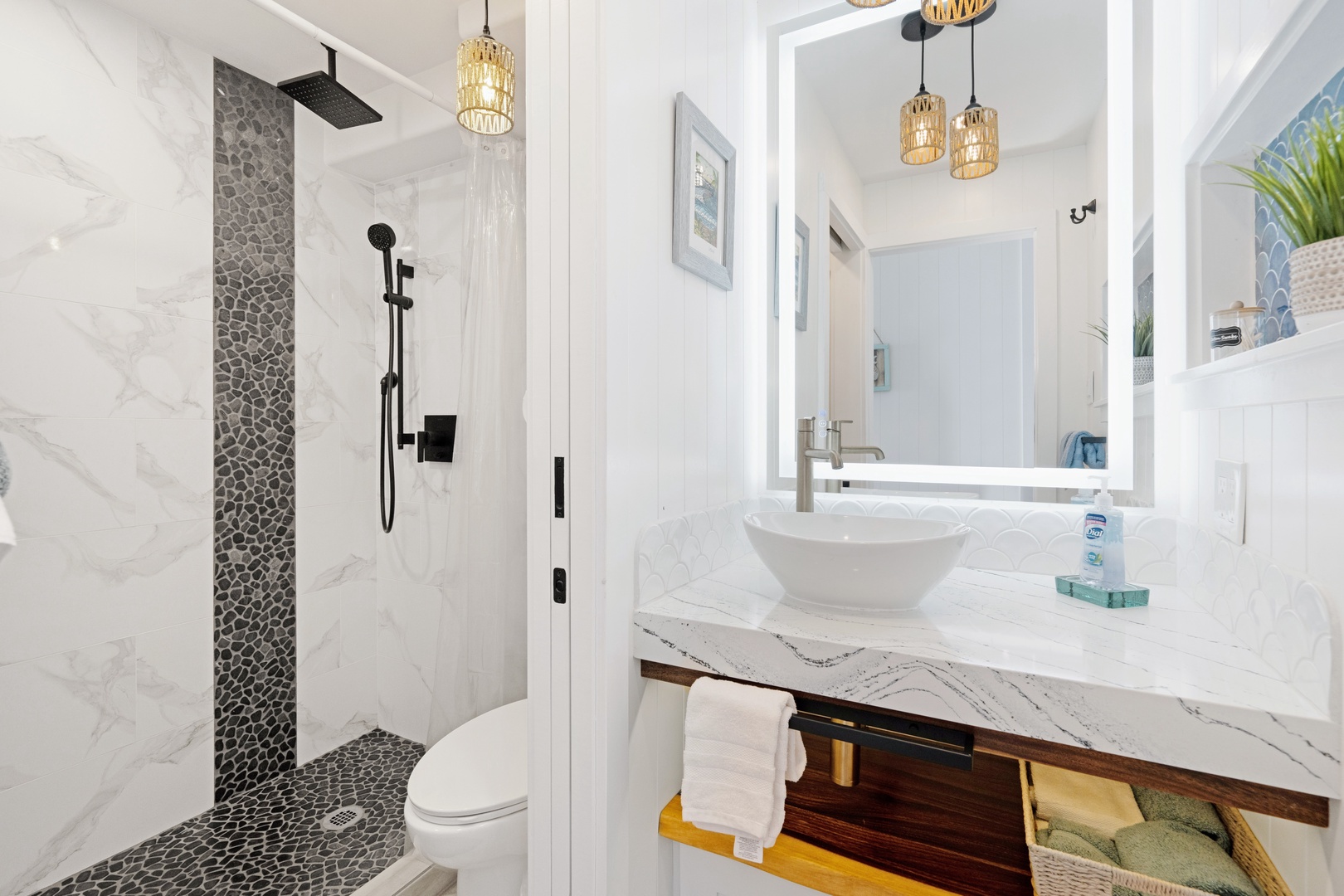 Kihei Vacation Rentals, Punahoa Beach 205 - The vessel sink and walk-in shower share space beneath warm pendant light in the morning.