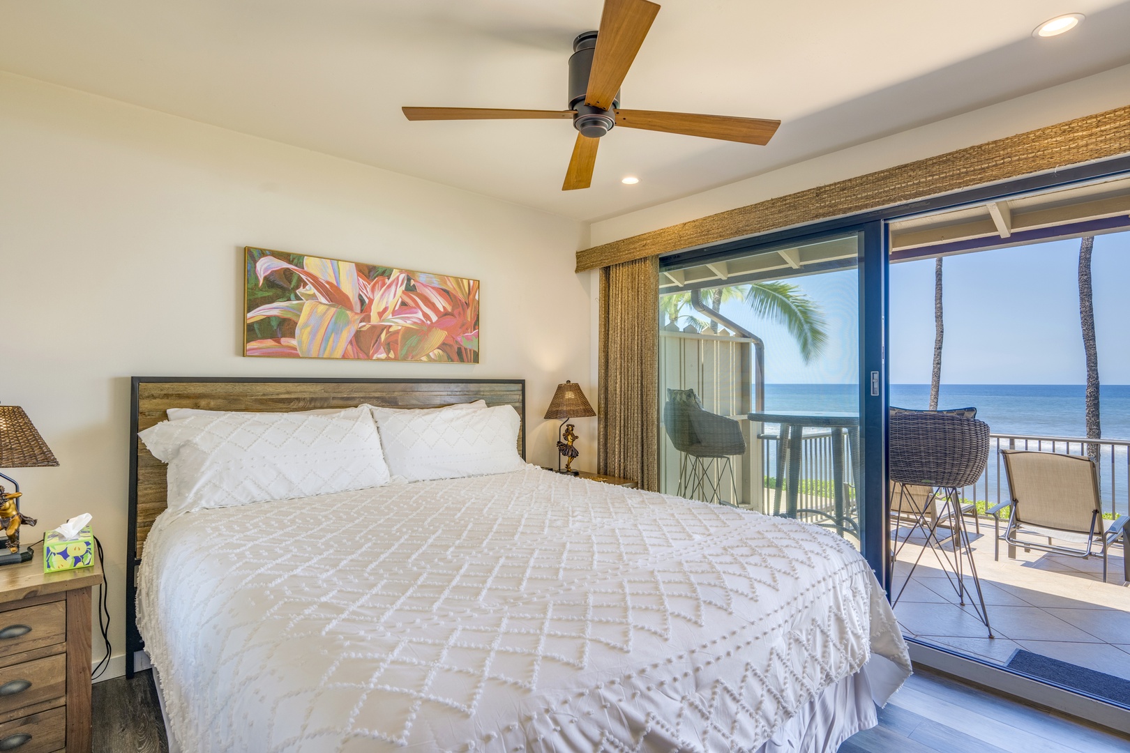 Lahaina Vacation Rentals, Puamana 240-3 - Wake up to breathtaking ocean views from the comfort of this beautifully designed primary bedroom retreat.