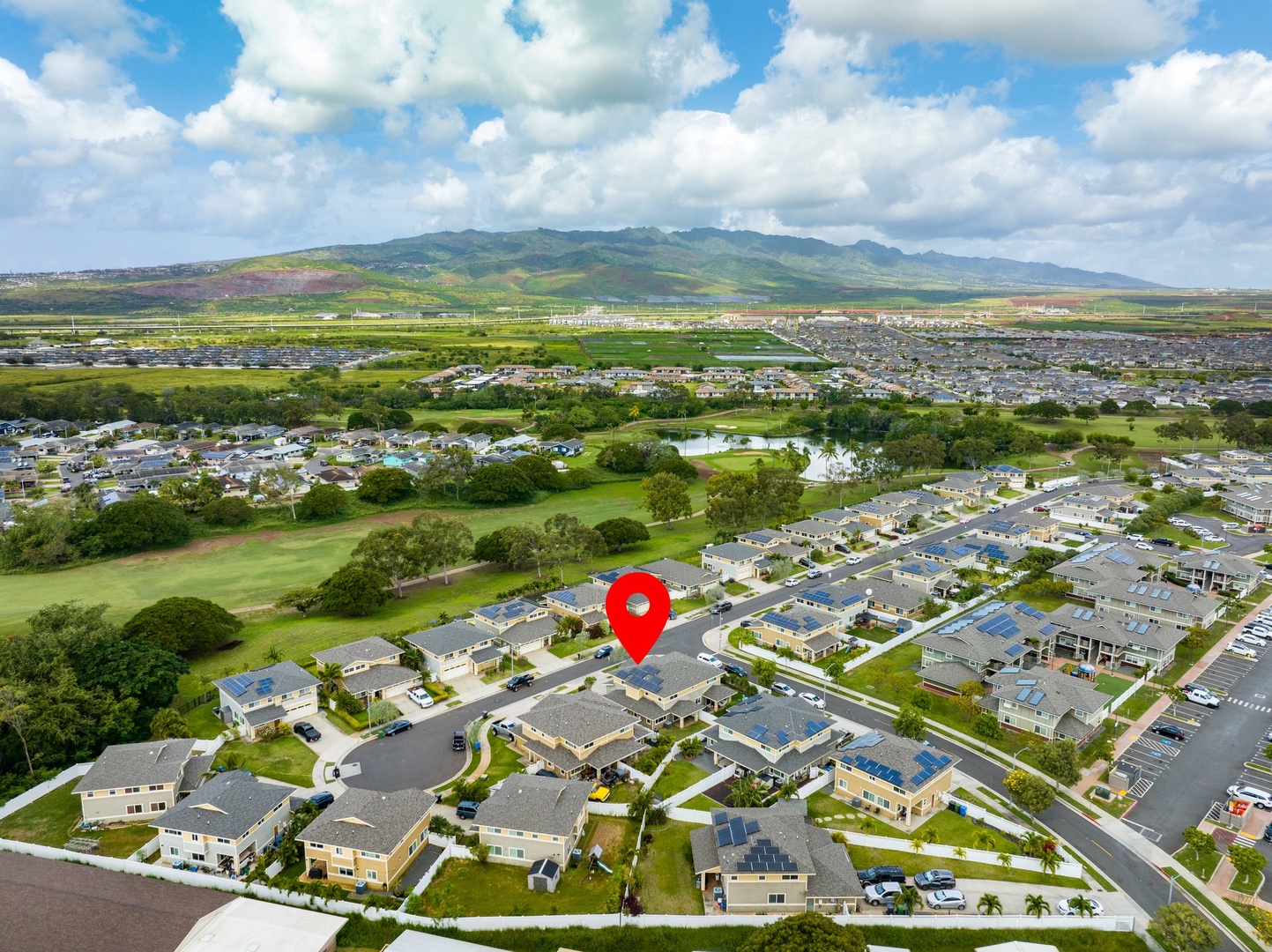 Kapolei Vacation Rentals, Kilipue Retreat - Bird’s-eye view showing proximity to community green spaces and scenic surroundings.