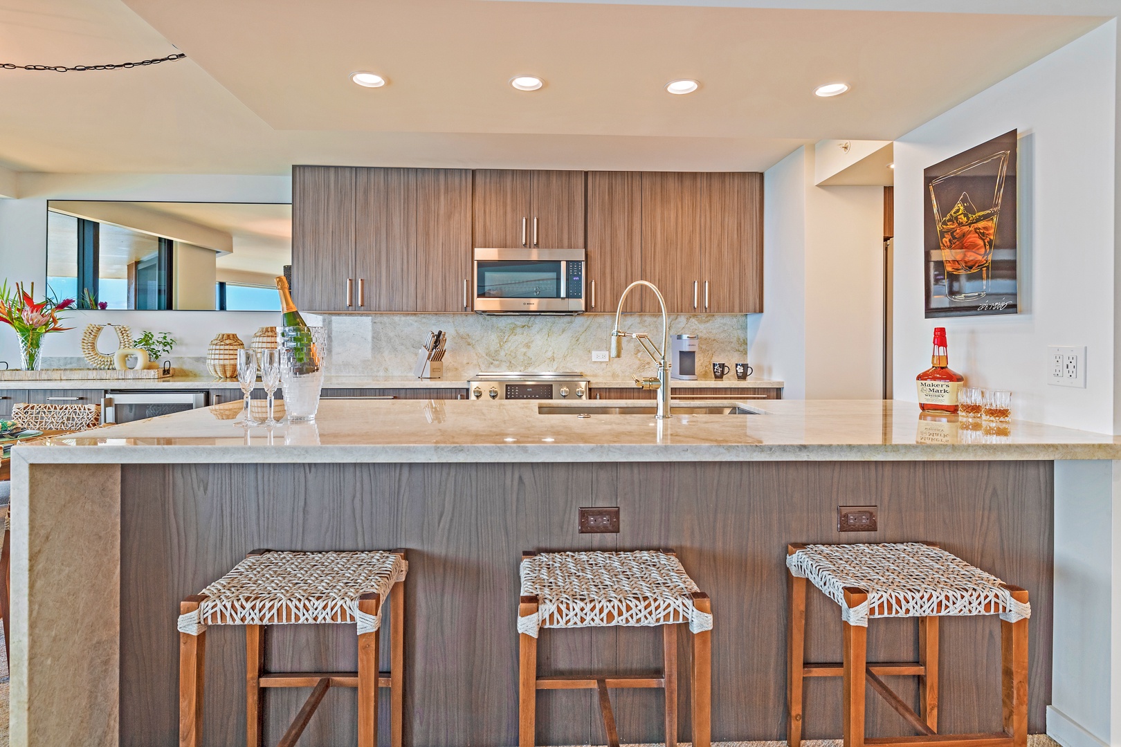 Lahaina Vacation Rentals, Kaanapali Shores 702 - This sleek kitchen island with barstool seating offers a great spot to enjoy casual meals or conversations while cooking.