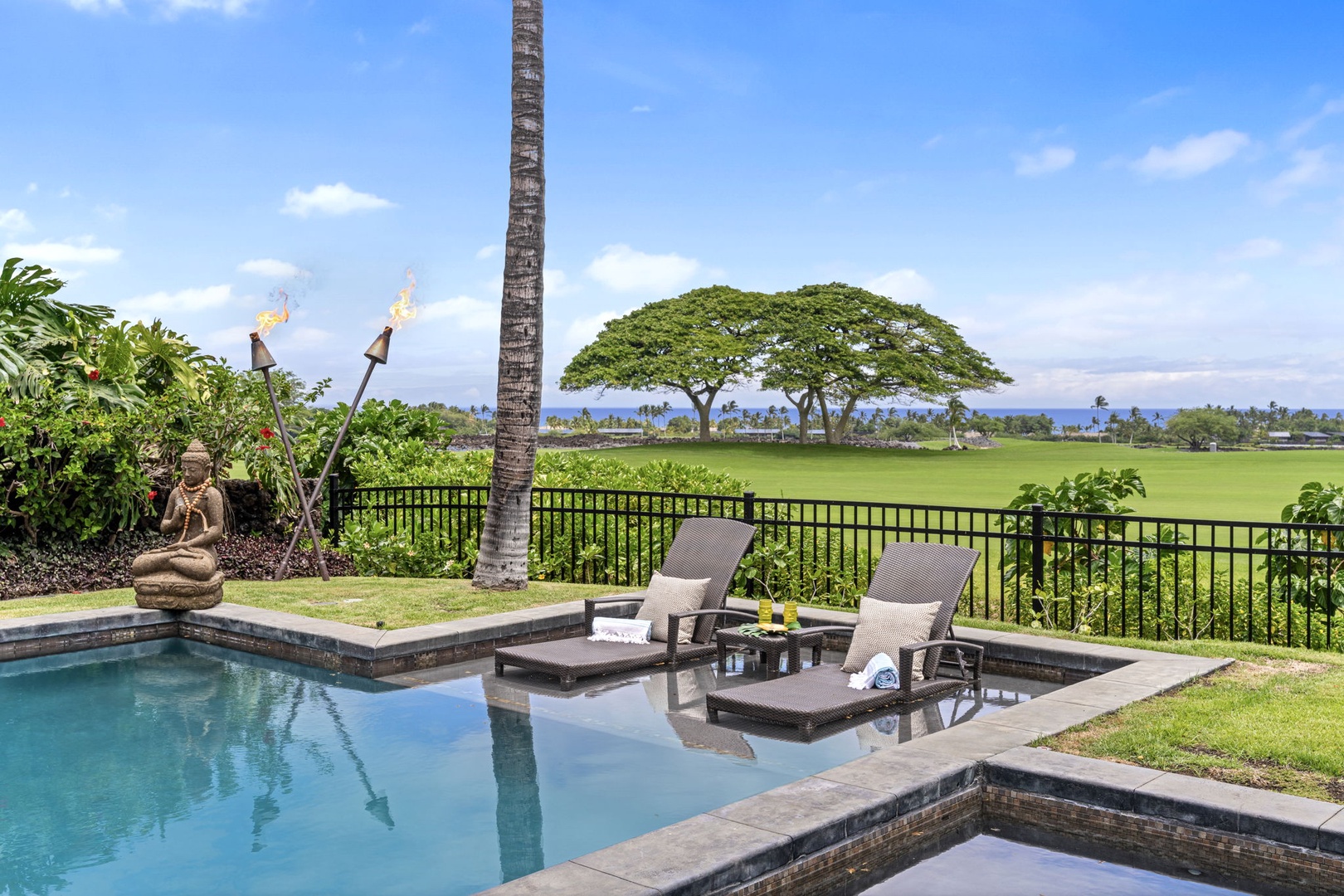 Kailua Kona Vacation Rentals, 3BD Pakui Street Estate (149) at Hualalai Resort - Claim a lounger by the private pool with the fairway and ocean stretched out beyond.