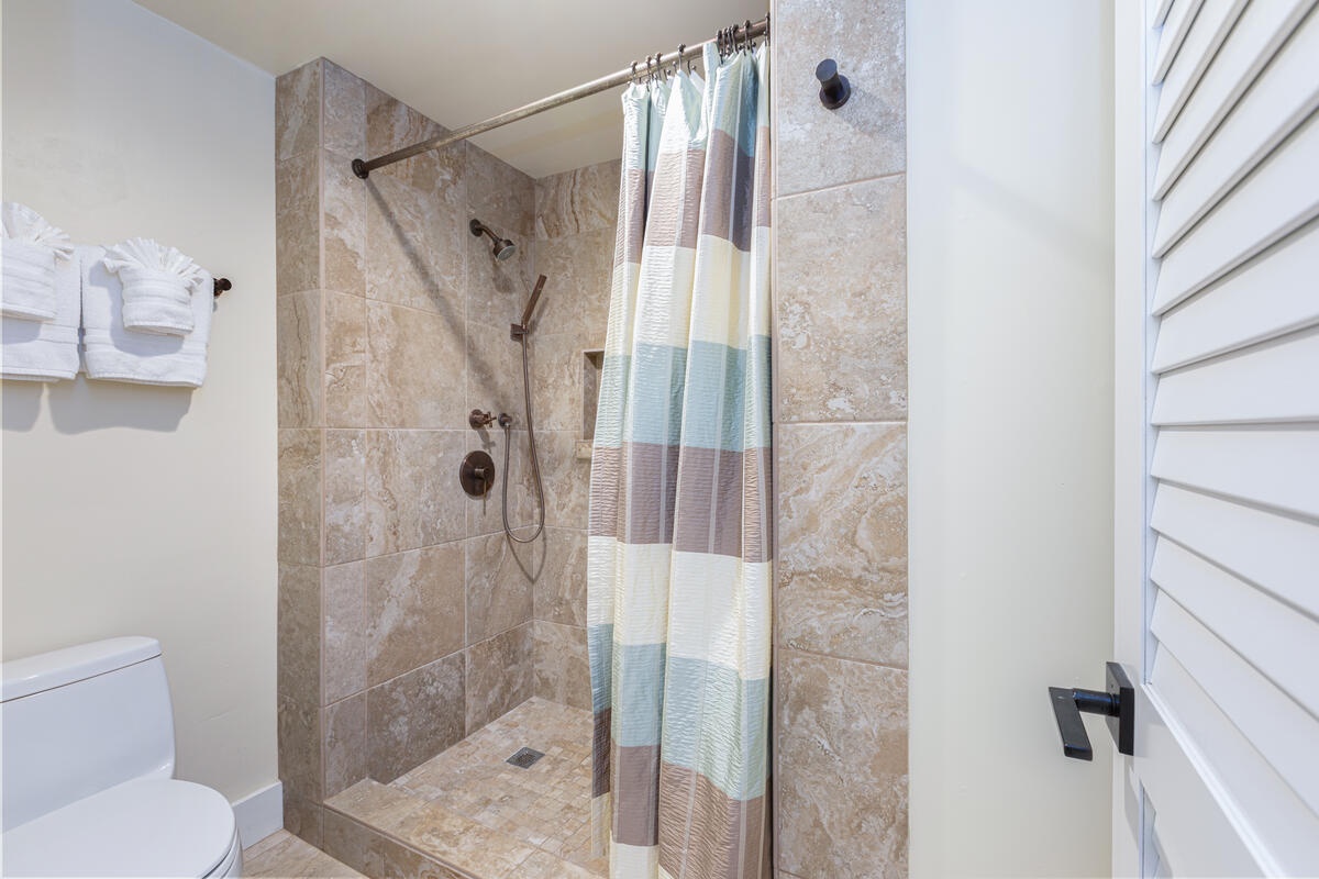 Princeville Vacation Rentals, Hanalei Bay Resort 1535/6 - One of two full bathrooms with a walk-in shower and updated tilework.