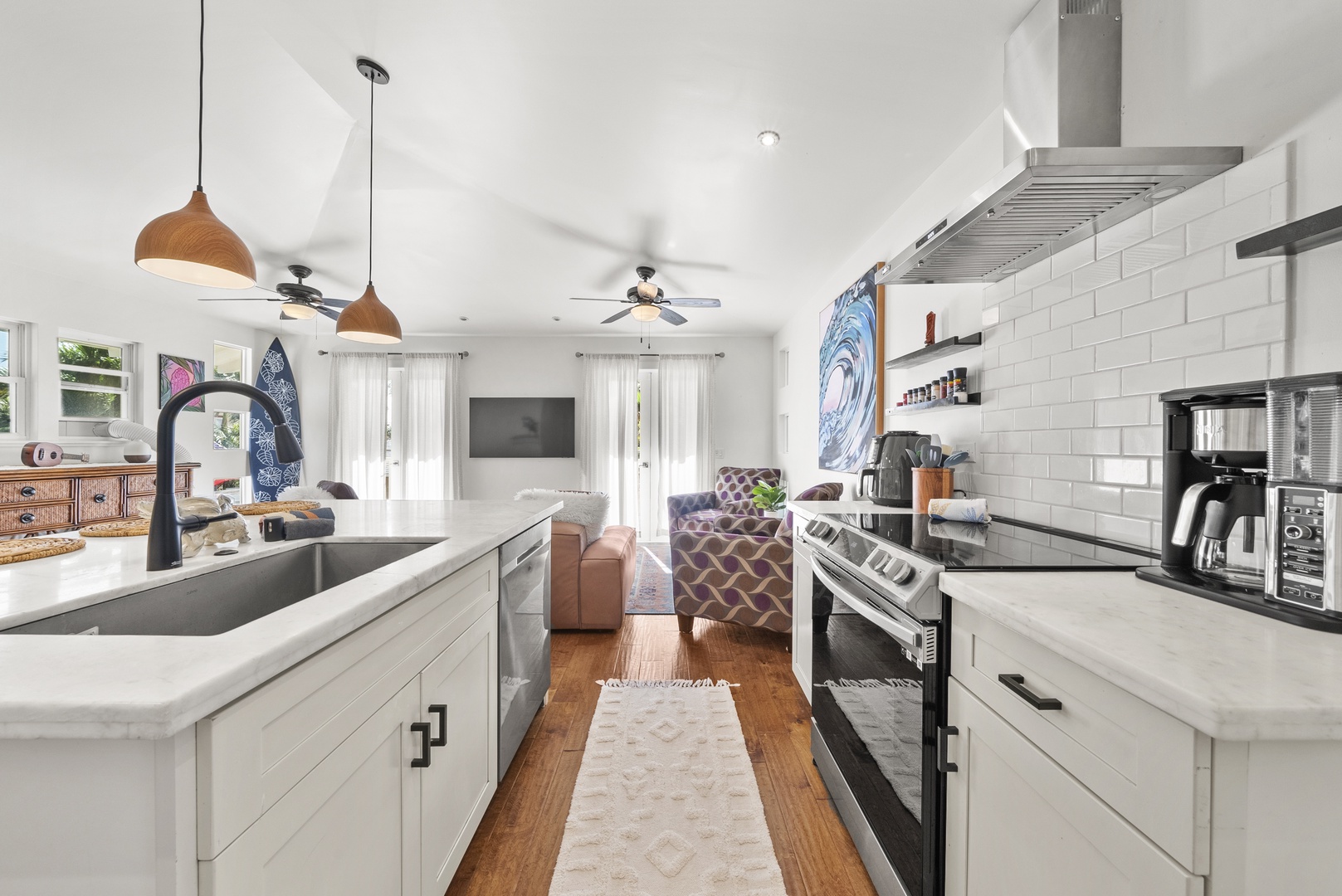 Kaaawa Vacation Rentals, Ka'a'awa Hale - Bright, open kitchen with modern finishes and a seamless flow into the living area.