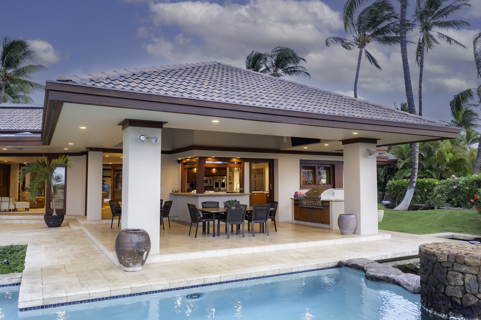 Kamuela Vacation Rentals, Champion Ridge 7 - Luxury villa with covered patio and pool, surrounded by tropical palms in a pristine setting.