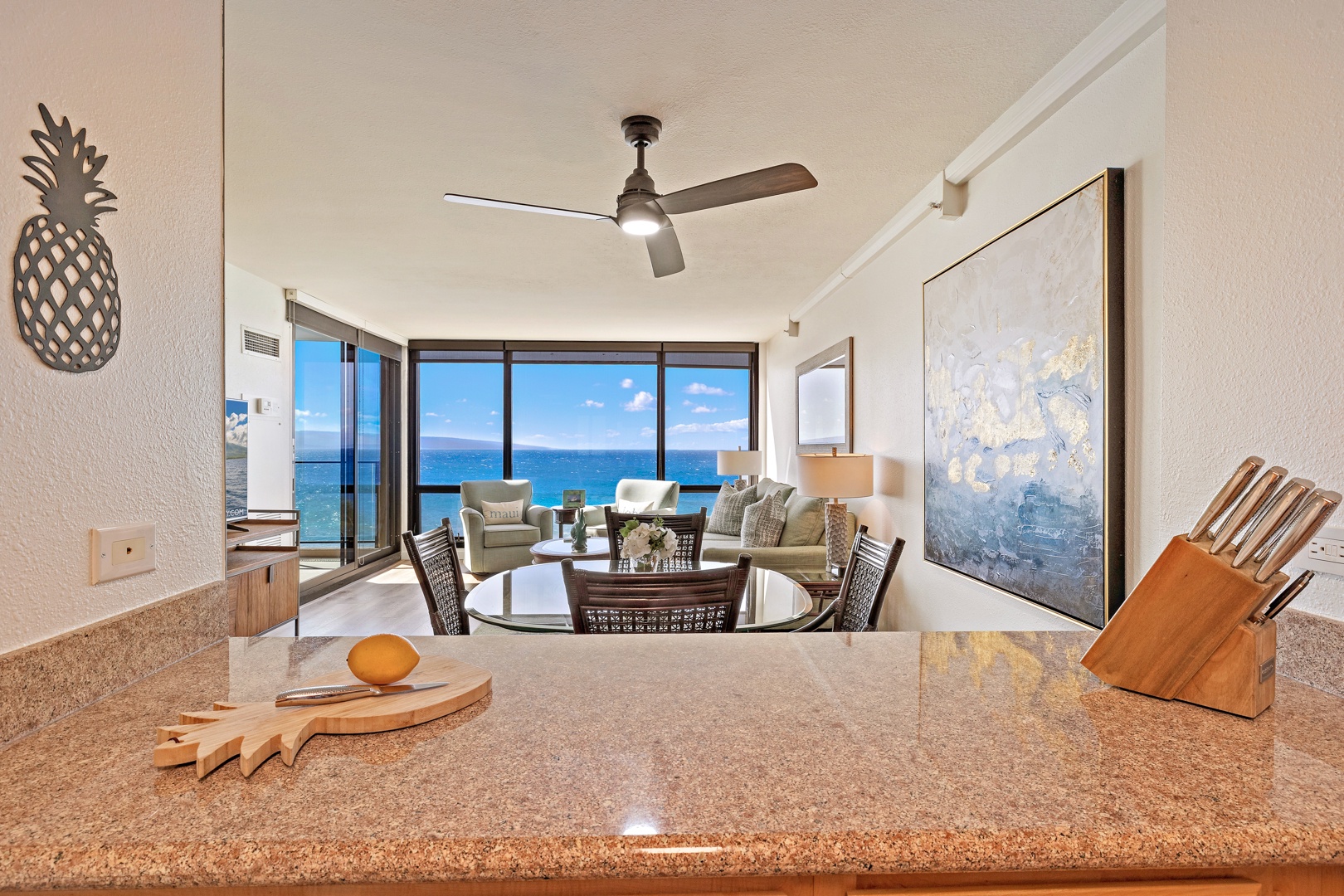 Lahaina Vacation Rentals, Mahana 718 - Enjoy the stunning ocean view from the comfort of your open-concept living and dining area.