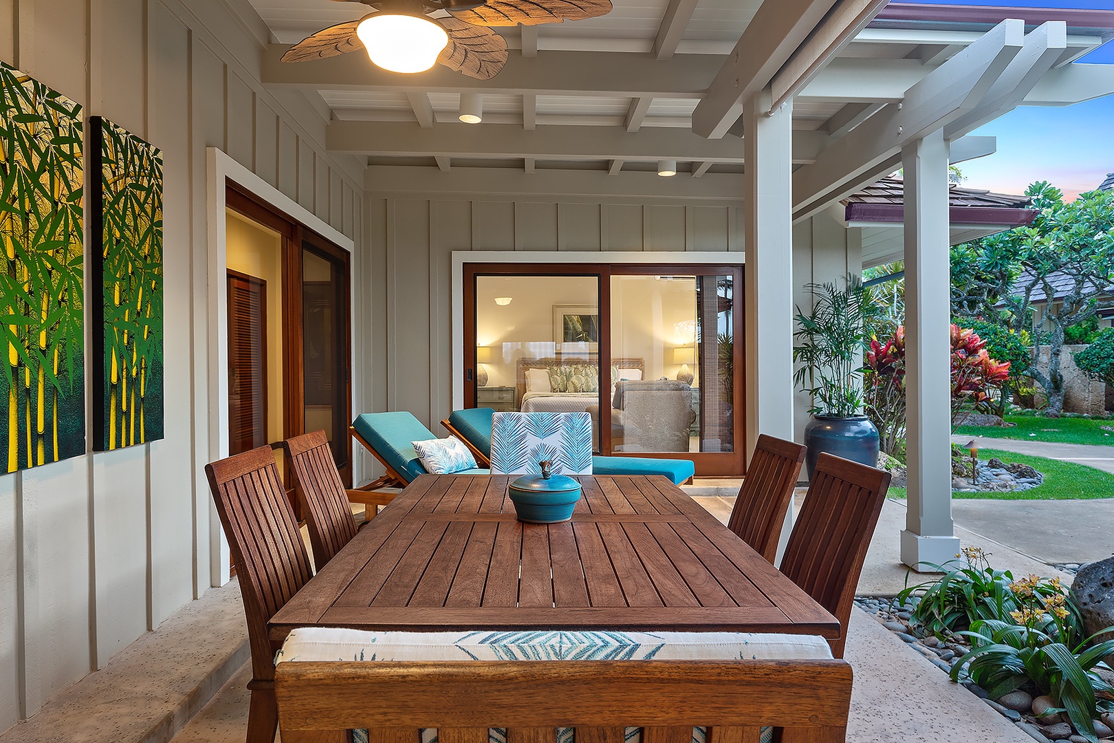 Kailua Vacation Rentals, Kailua Shores Estate 5 Bedroom - Outdoor Dining area with seating for six, offering a cozy setting for al fresco meals amidst tropical surroundings.