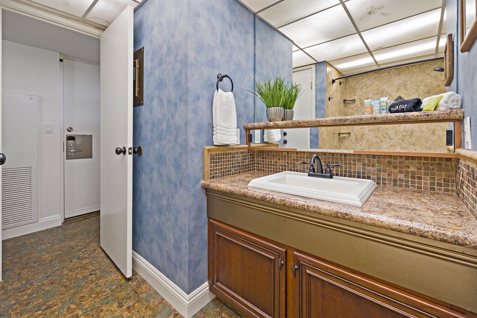 Lahaina Vacation Rentals, Kaanapali Shores 544 - Kaanapali Shores 544’s bathroom features a stylish vanity and sleek fixtures, perfect for refreshing.
