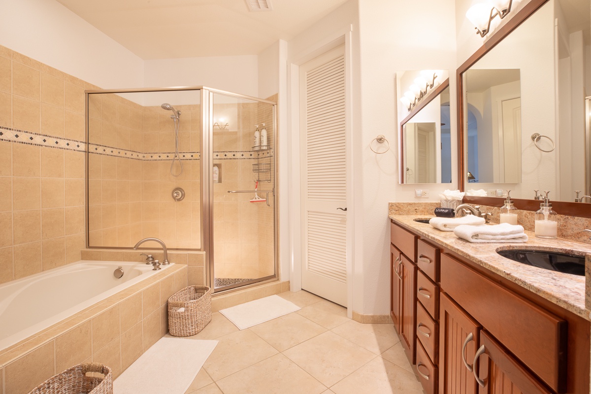 Kamuela Vacation Rentals, Mauna Lani Golf Villas C1 - Primary ensuite Bathroom upstairs with large soaking tub and shower