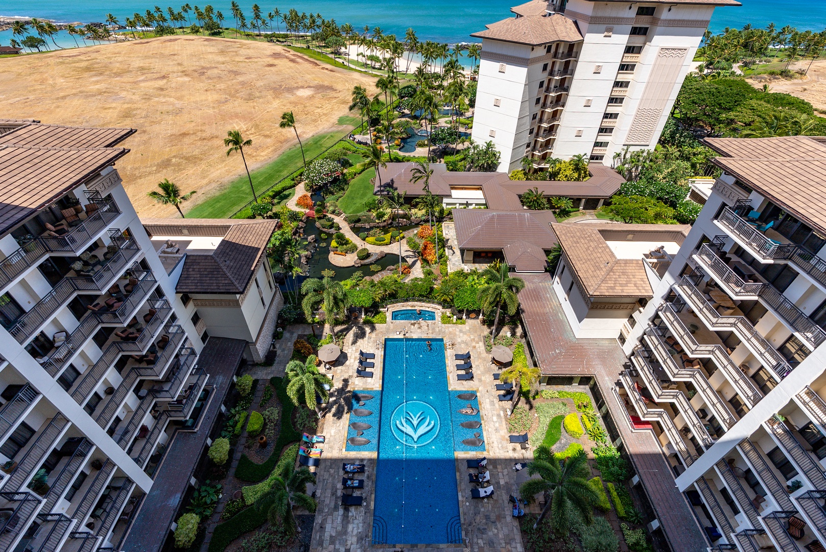 Kapolei Vacation Rentals, Ko Olina Beach Villas O1404 - Head down to the resort's pools and garden paths, laid out below the tower.