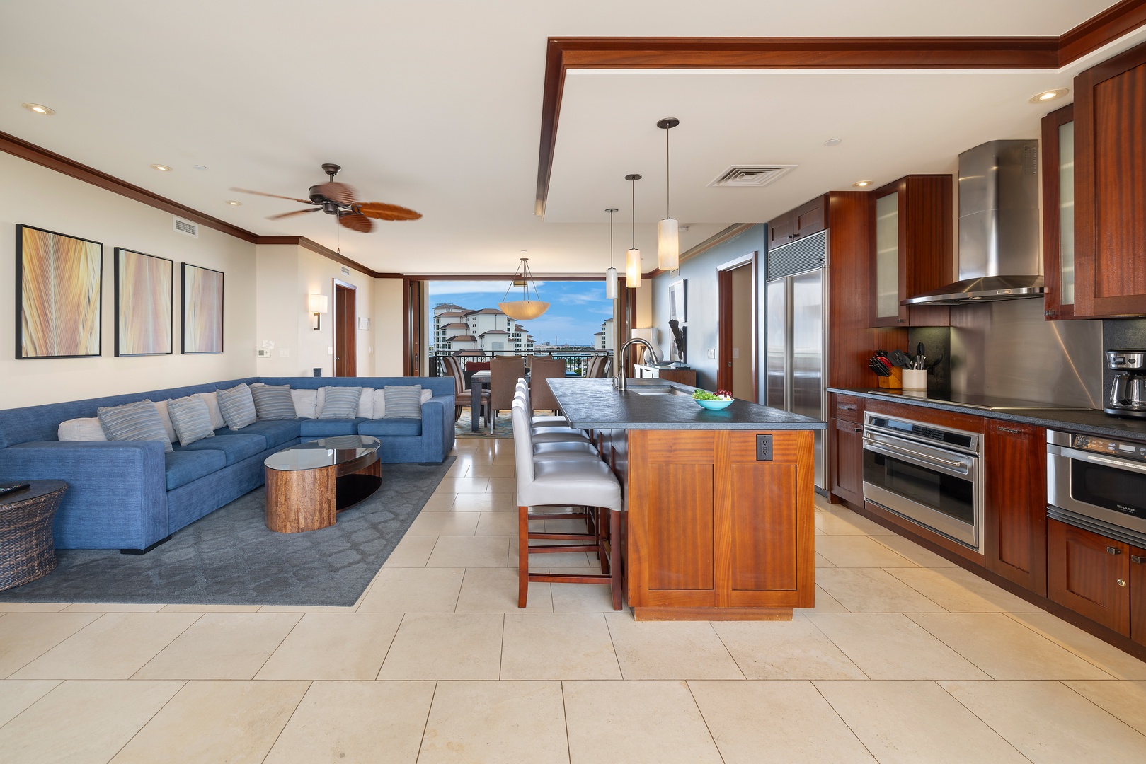 Your spacious open-concept retreat blends luxury and comfort, with a gourmet kitchen island perfect for gathering and ocean views that inspire every moment.
