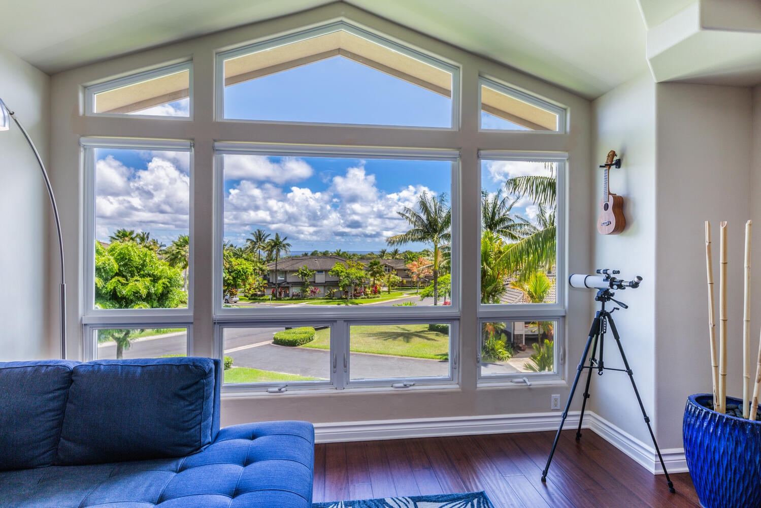 Princeville Vacation Rentals, Noelani Kai - Experience the sublime beauty of your surroundings from our living area, complete with a high-powered scope for up-close observations whether daytime or night time.