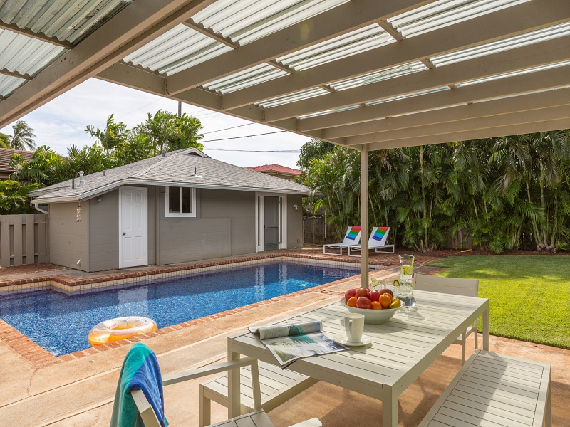 Honolulu Vacation Rentals, Ho'okipa Villa - The backyard features a sparkling pool and the charming guest cottage.