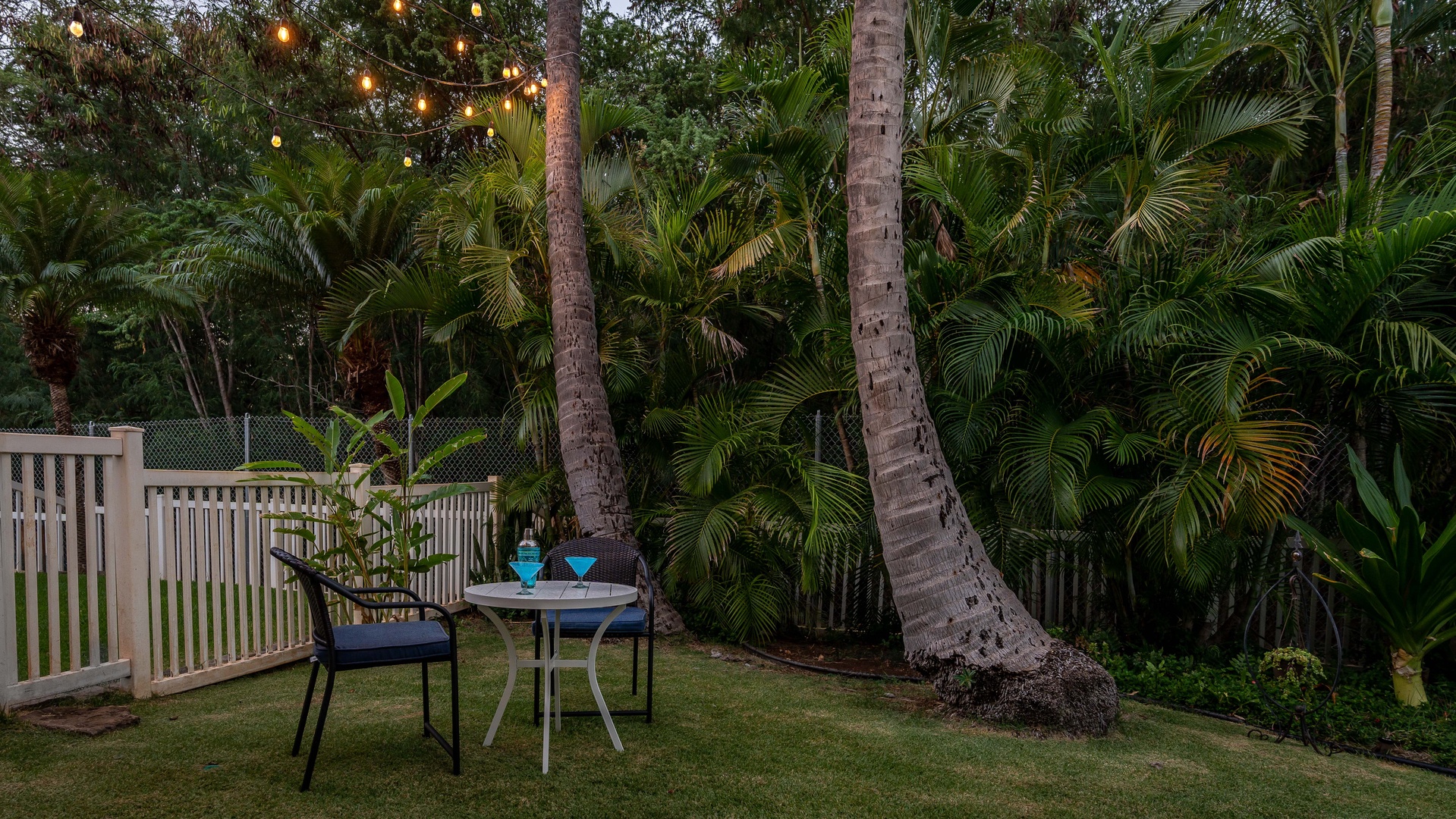 Kapolei Vacation Rentals, Fairways at Ko Olina 4A - The tranquil backyard where you can dine al fresco under swaying palm trees.