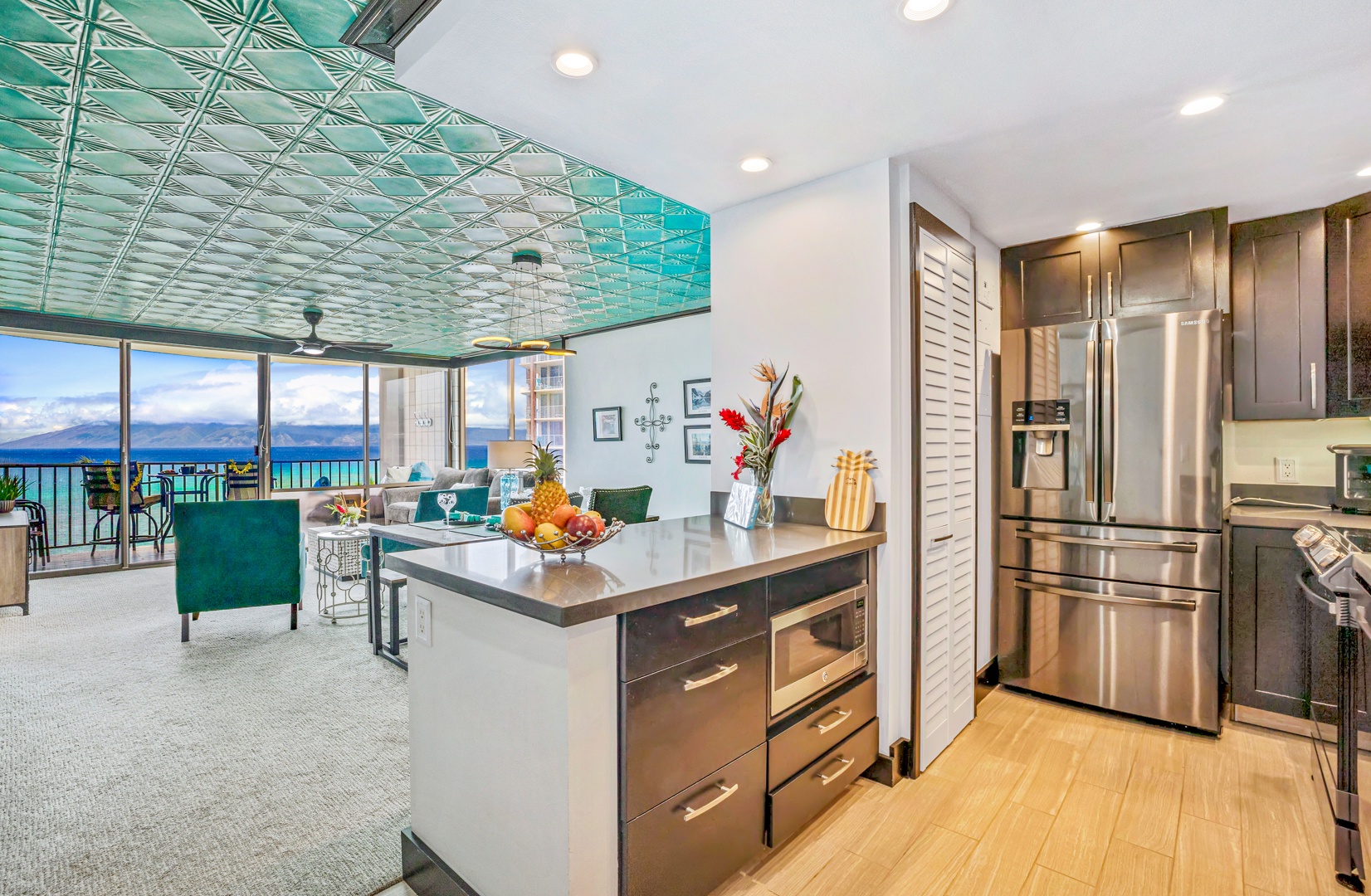 Lahaina Vacation Rentals, Valley Isle 804 - The modern kitchen boasts stainless steel appliances and a sleek design, offering a perfect space to prepare meals