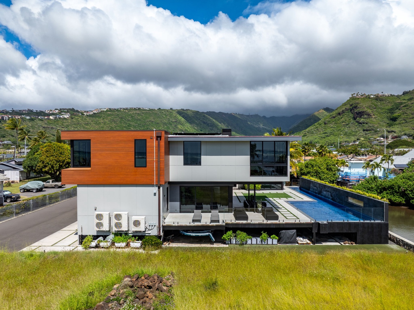 Honolulu Vacation Rentals, Ocean Villa Emilie - An aerial view of Ocean Villa Emilie reveals its private, elevated setting along the lush Honolulu hillside.