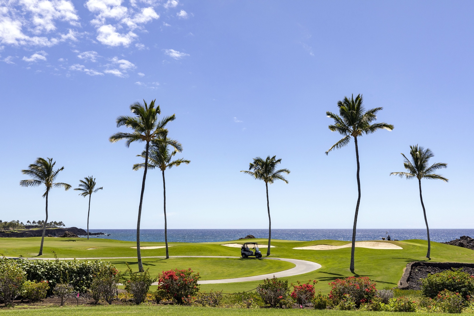 Kamuela Vacation Rentals, Mauna Lani Point E105 - Views of the 13th fairway and ocean.