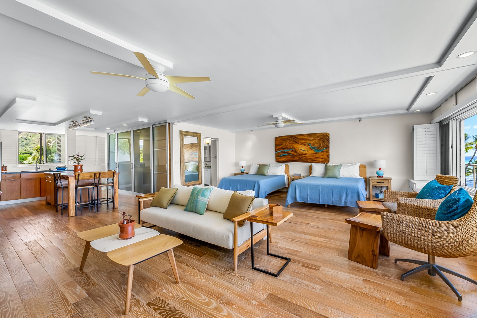 Honolulu Vacation Rentals, Colony Surf Luxe - Open-concept layout featuring comfortable seating, TV entertainment, and full views of the Pacific.