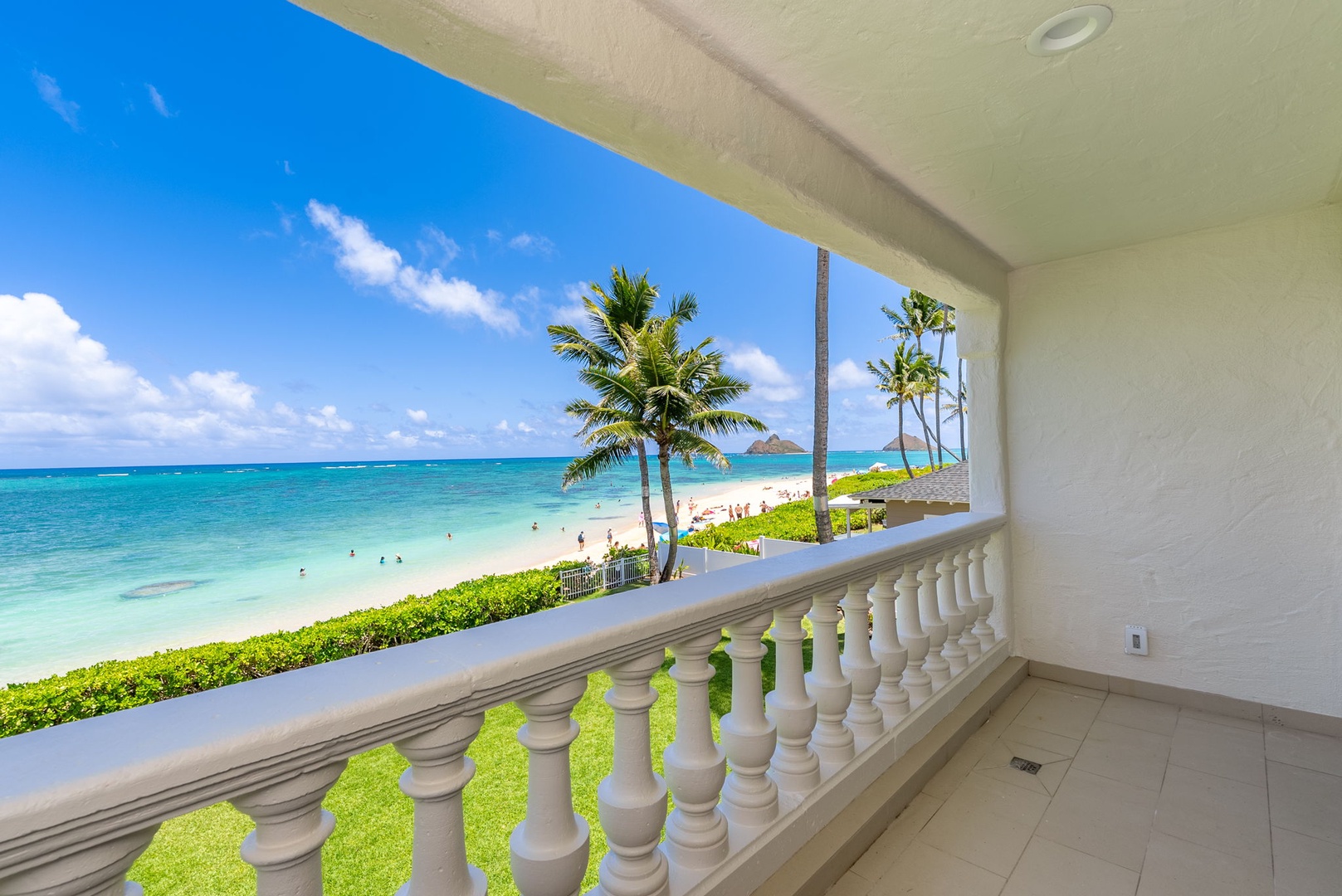 Kailua Vacation Rentals, Lanikai Sunrise Estate - Lanai off the primary suite offers a peaceful perch for morning coffee and ocean breezes.