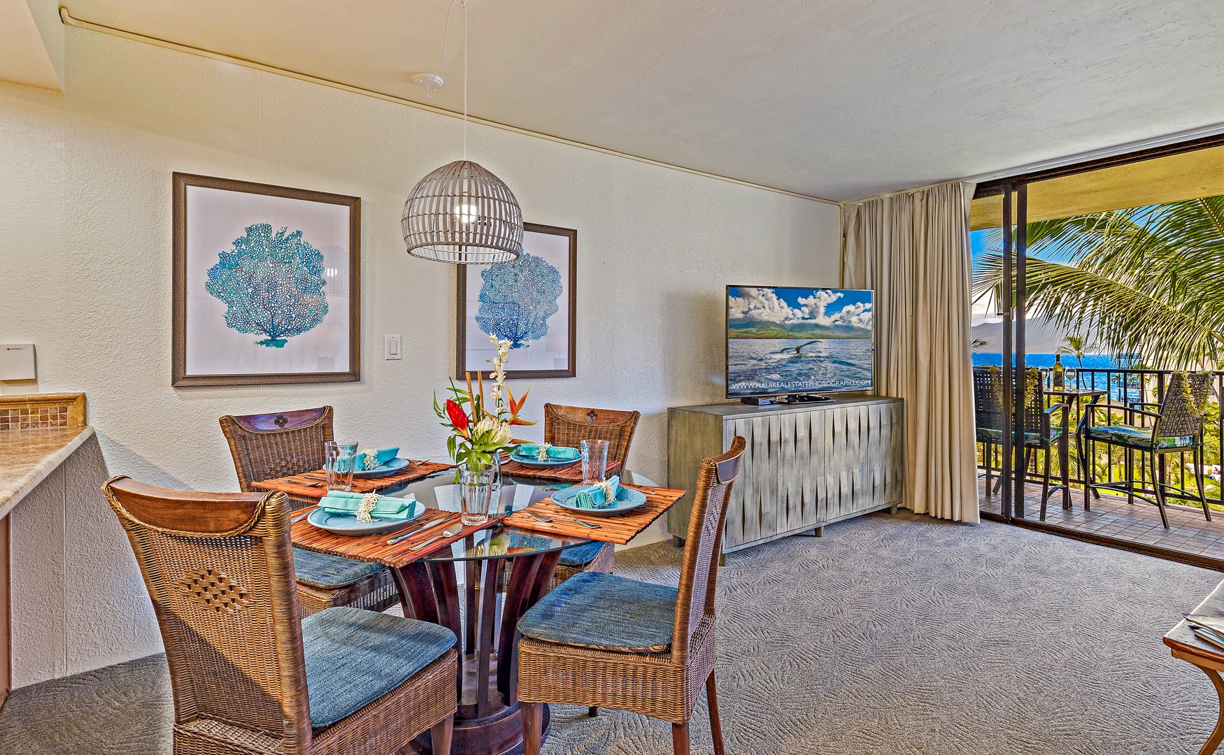 Lahaina Vacation Rentals, Kaanapali Shores 544 - The inviting dining area, with comfortable seating for four, offers a cozy space for family meals or relaxed gatherings