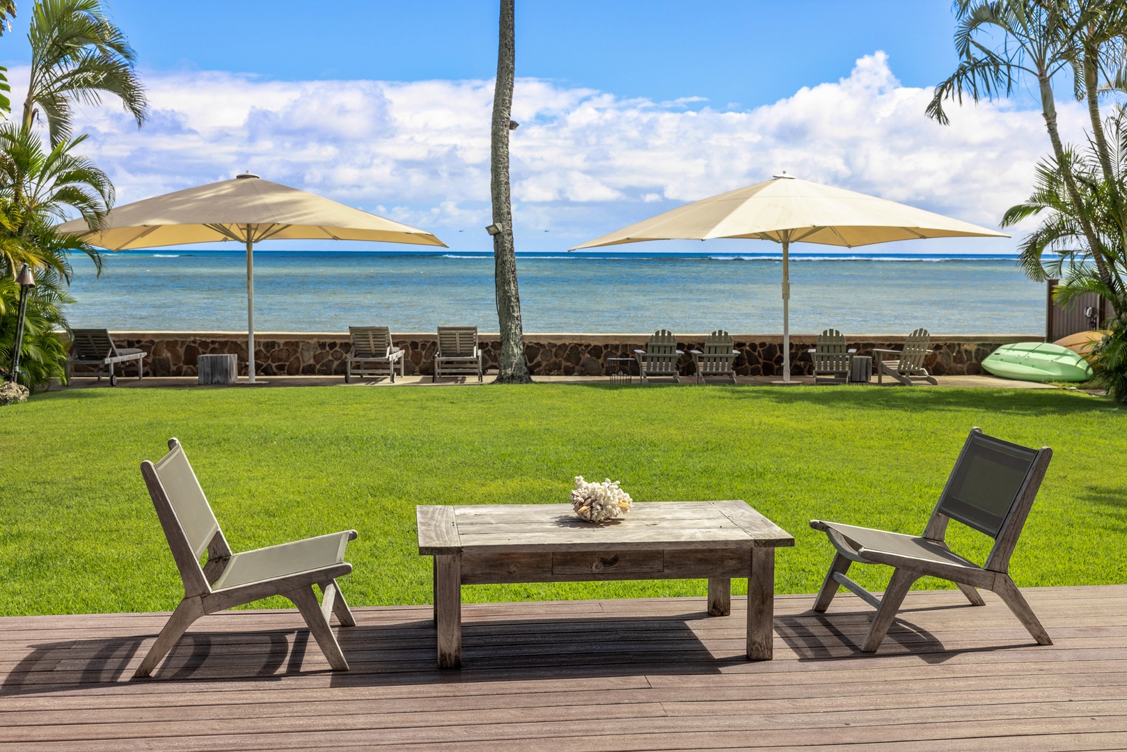 Honolulu Vacation Rentals, Moana Lani - Relax with front-row ocean views from the lawn seating area.