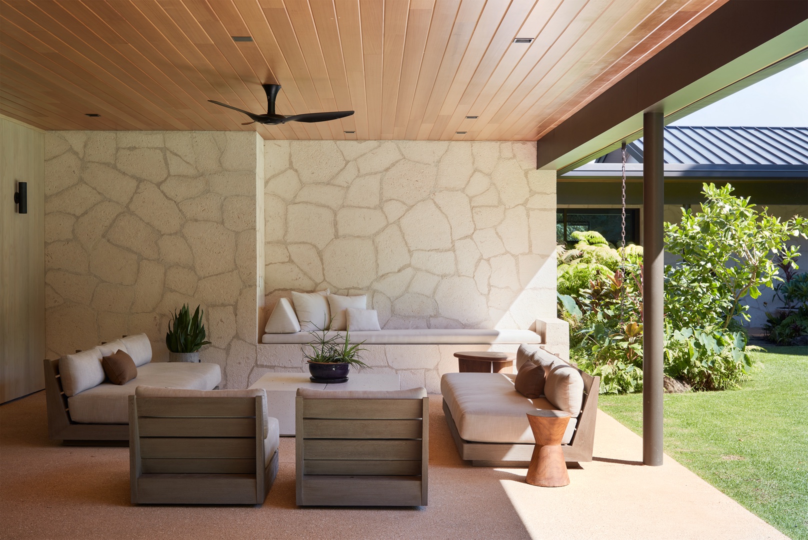 Honolulu Vacation Rentals, Diamond Head Hillside Estate** - Relax in the shade of the spacious covered lanai, where comfortable seating and tropical surroundings create an inviting setting for conversation and quiet afternoons.
